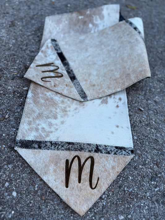Table runner includes engraving initial