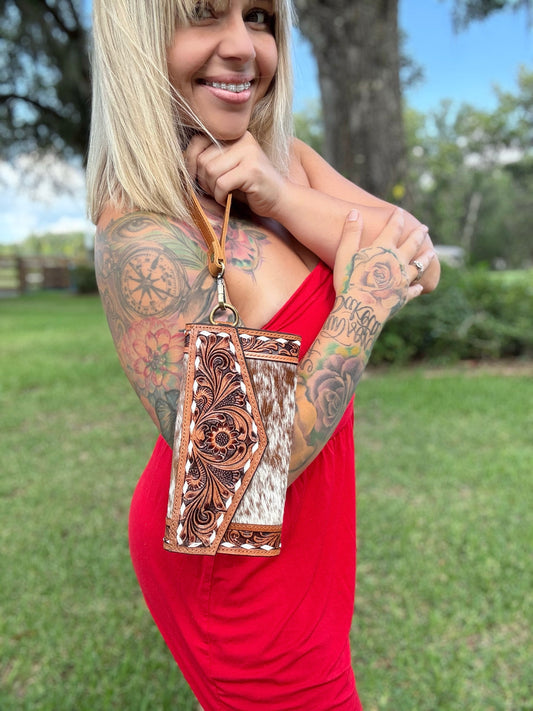 Cowhide tooled leather clutch wristlet