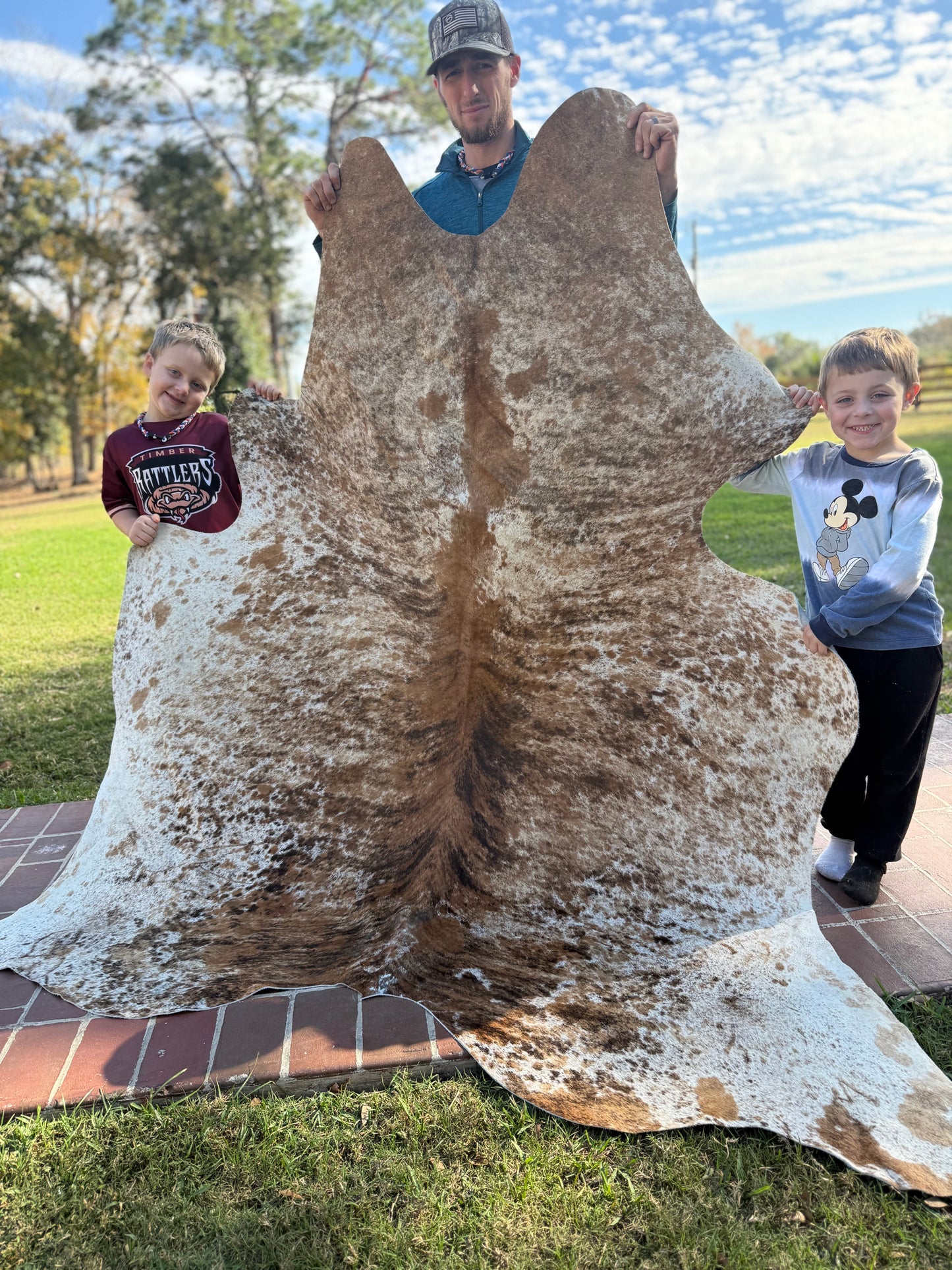 Exotic hide rug (light) 7’9”