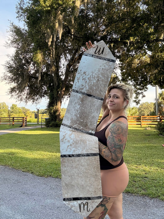 Table runner includes engraving initial