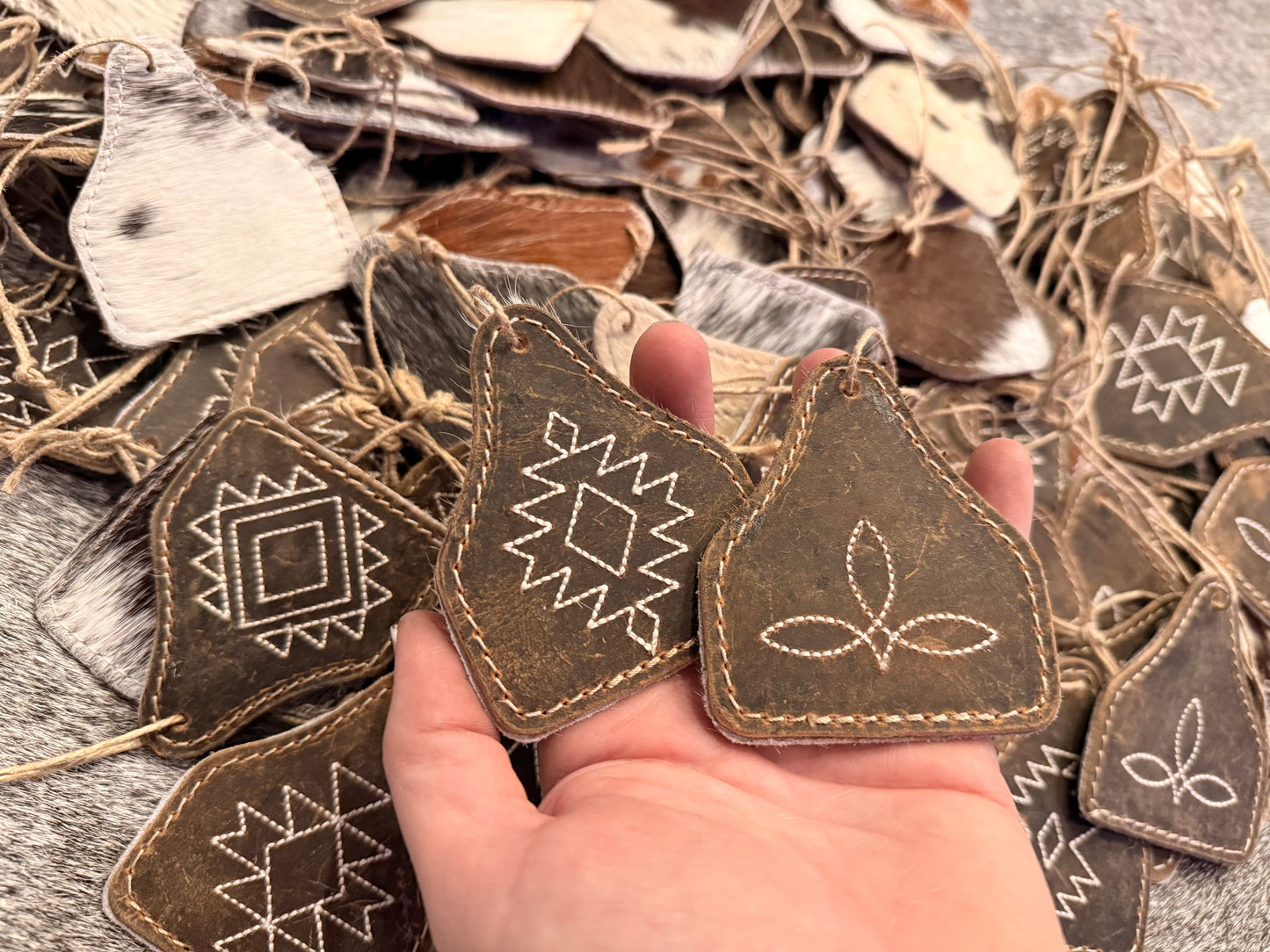 Western stitched, leather and cowhide ornament Western stitched, leather and cowhide ornament 3”