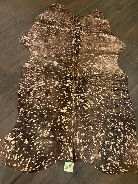 6’11” rose gold cowhide acid wash rug
