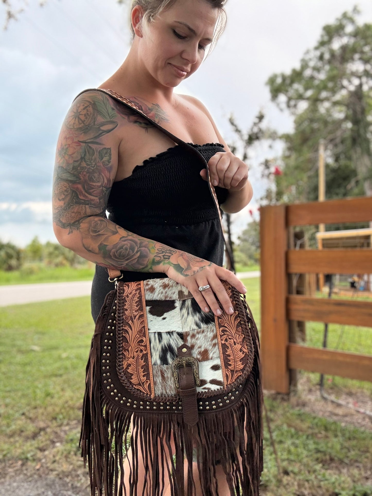 Tooled leather and cowhide purse