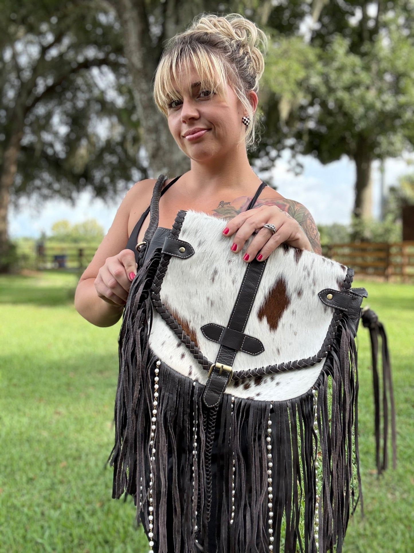 Cowhide beaded braided purse