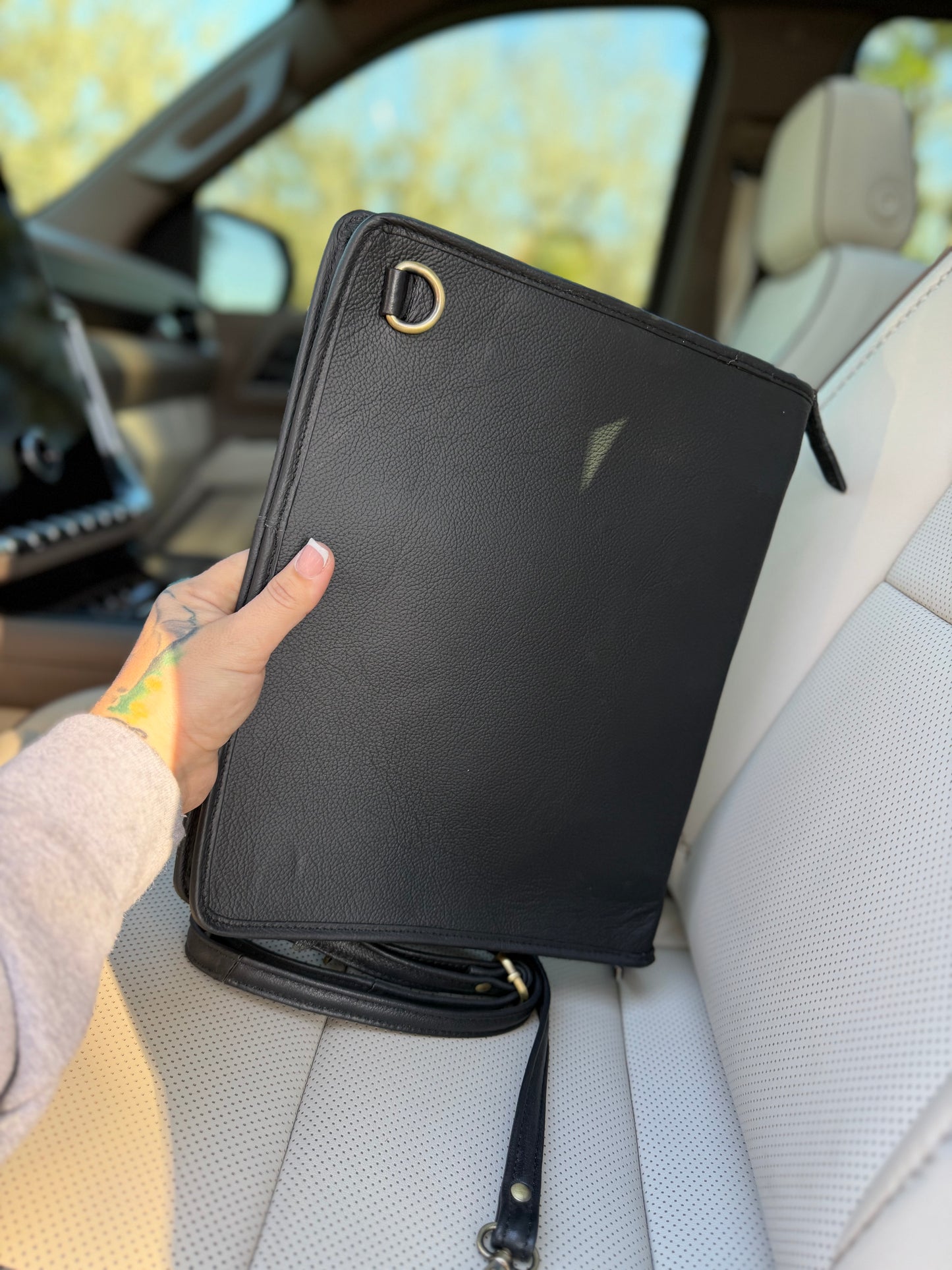 Tooled leather checker print binder