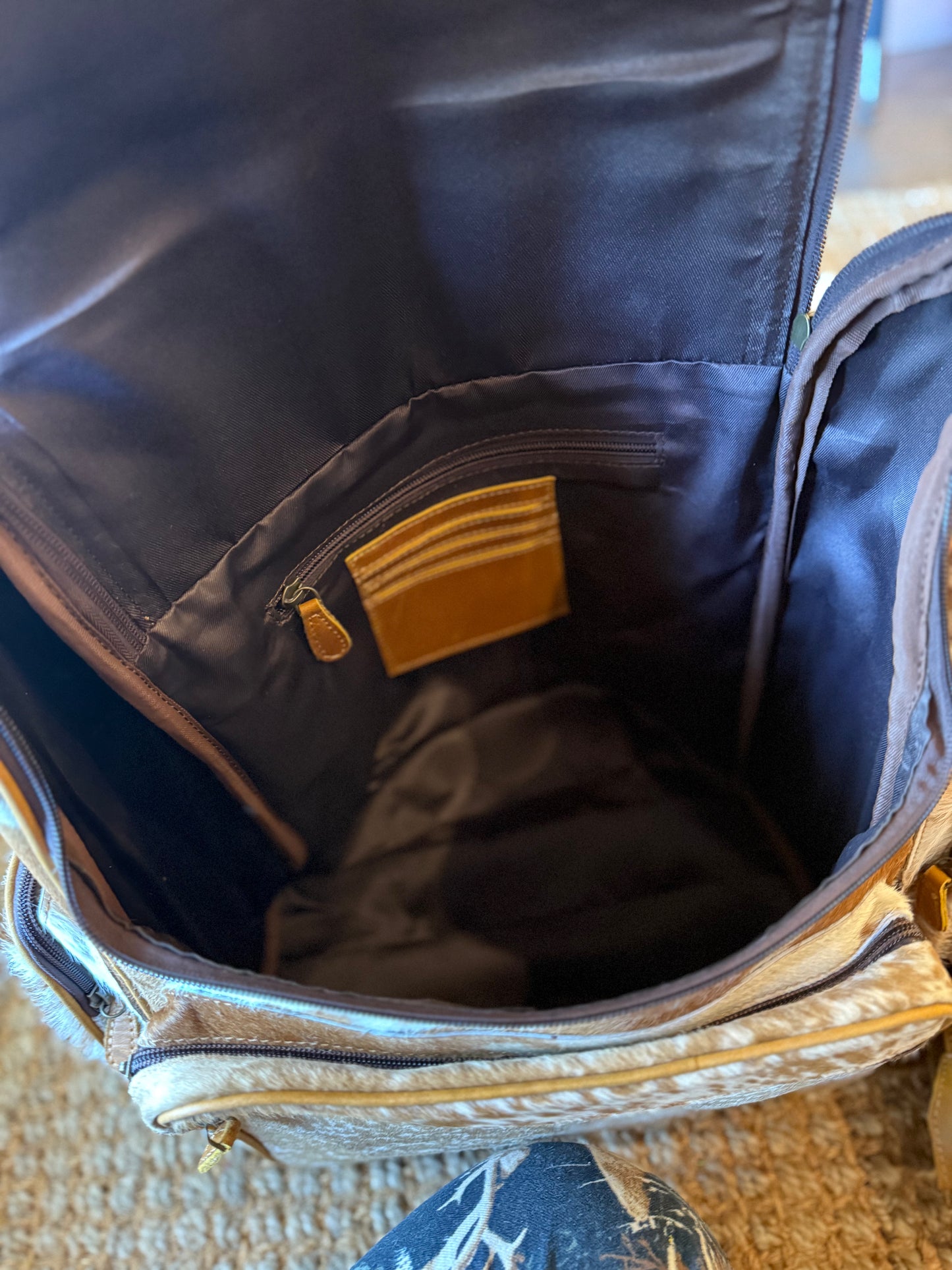 Cowhide tooled leather bookbag