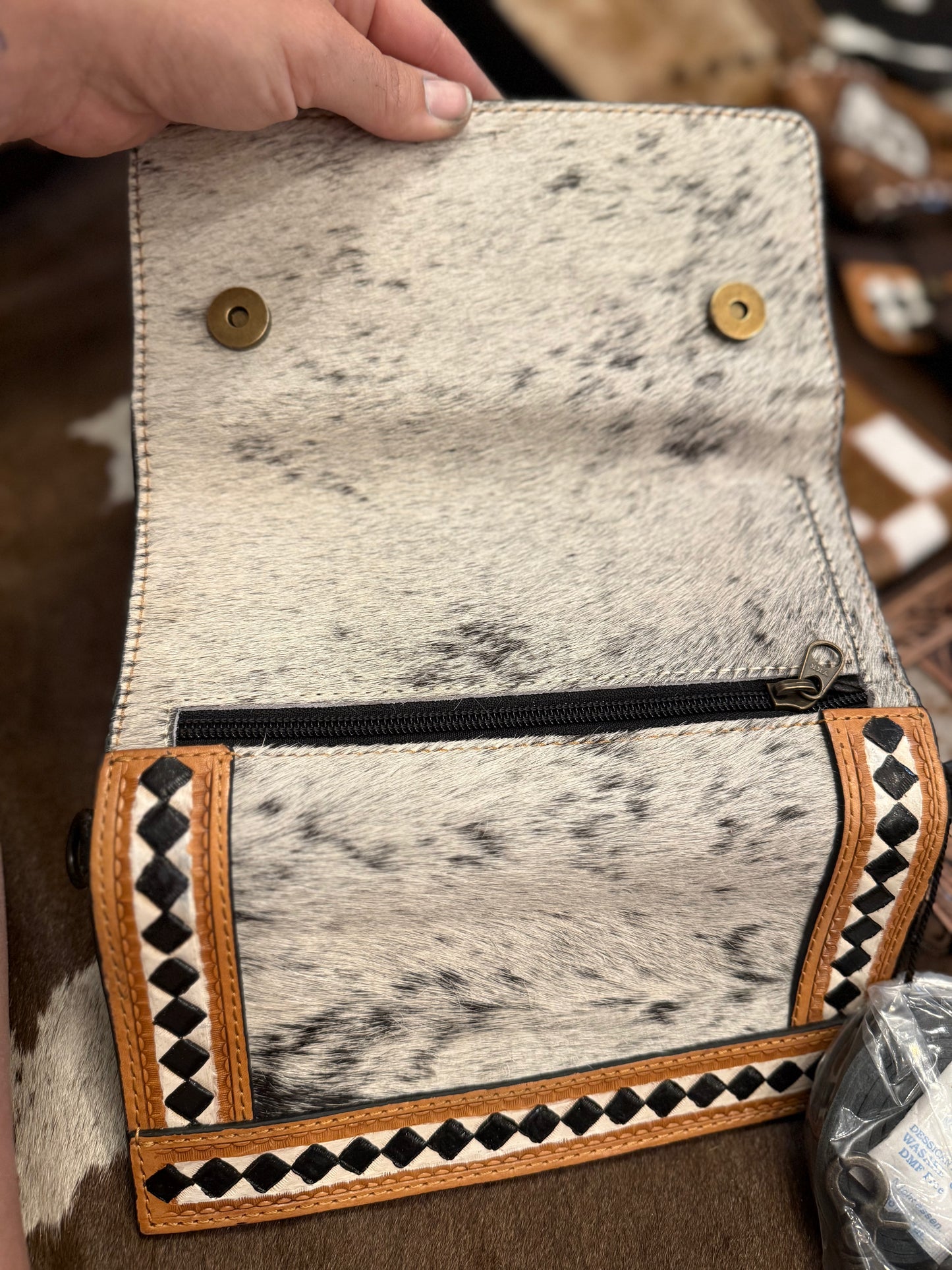Checker wallet has strap for clutch
