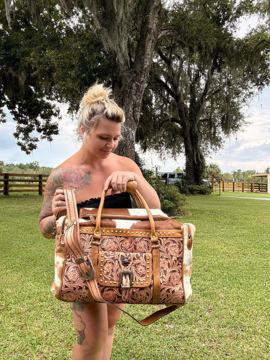 Duffle tooled leather and cowhide