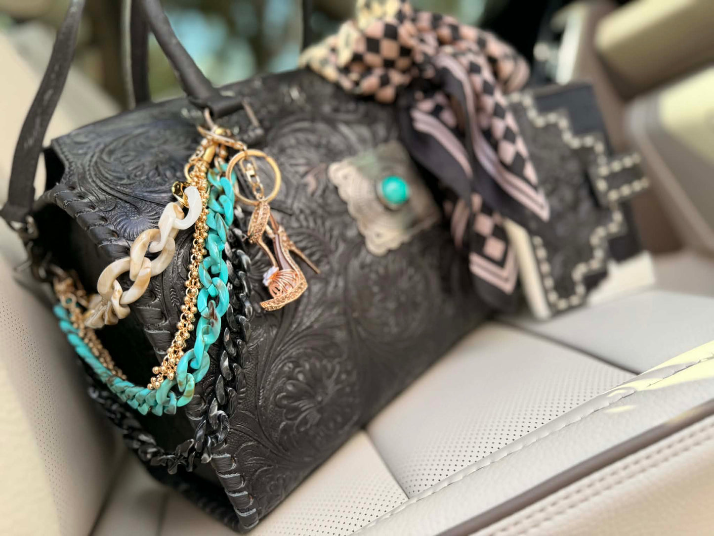 "Turquoise after Dark" - black tooled leather speedy duffle
