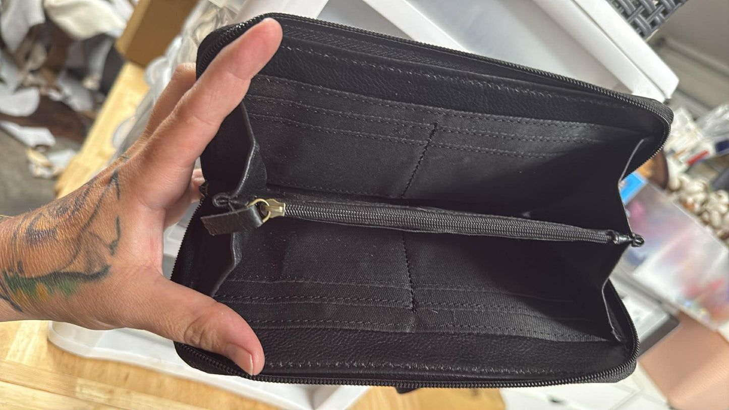 Red- tooled leather wallet