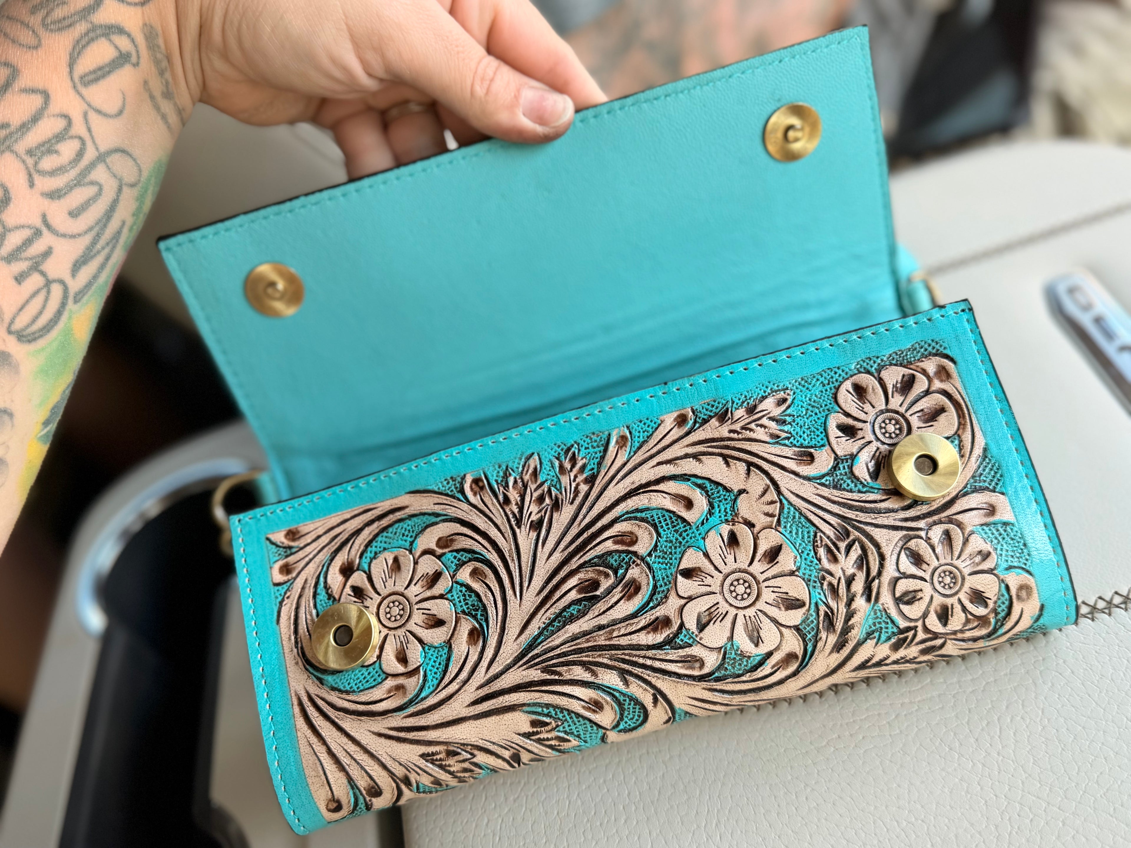 Tooled leather clutch crossbody