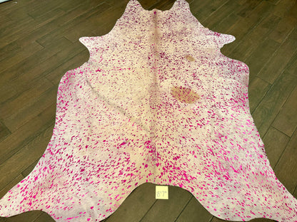 8’7” pink acid wash cowhide rug