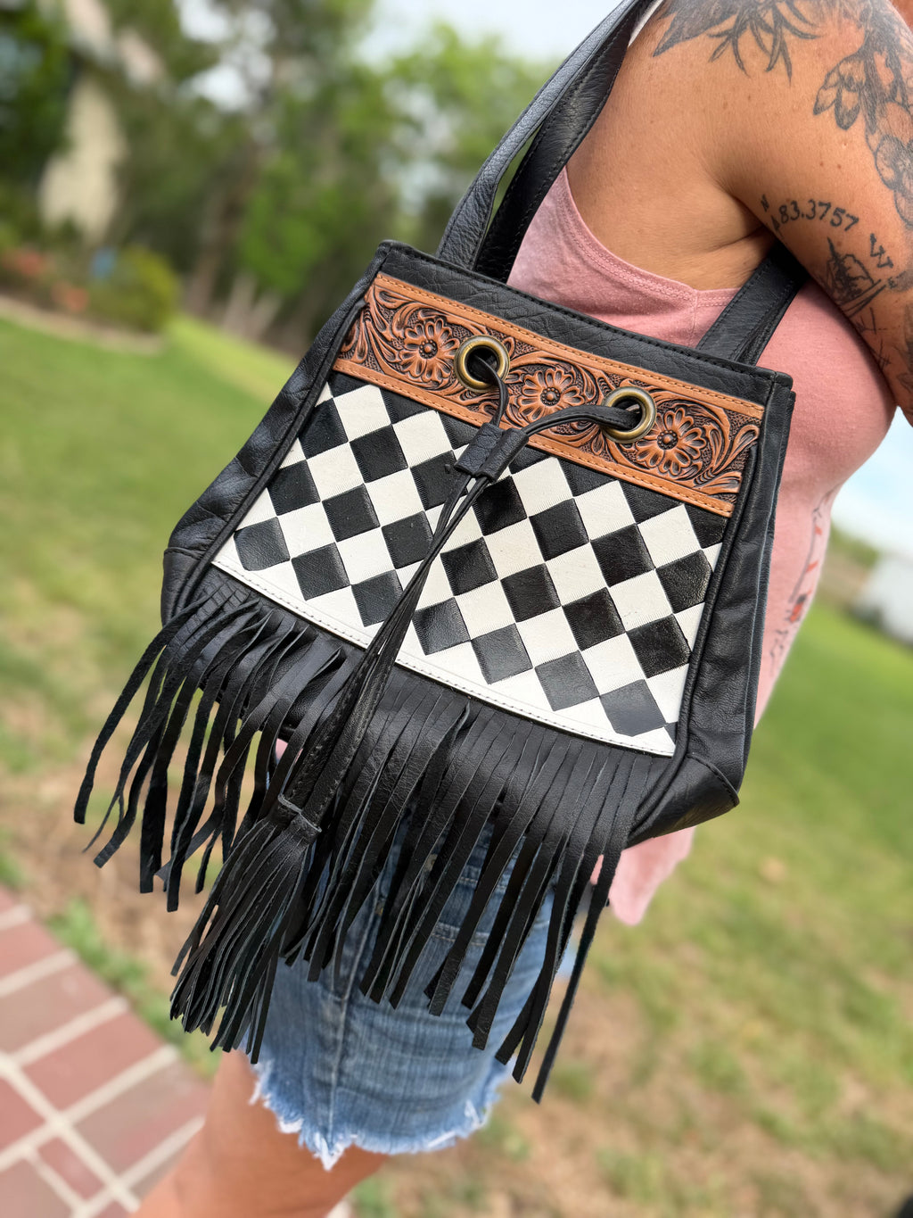 Checker sling bag with fringe