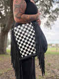 Checker tooled leather hobo bag with fringe