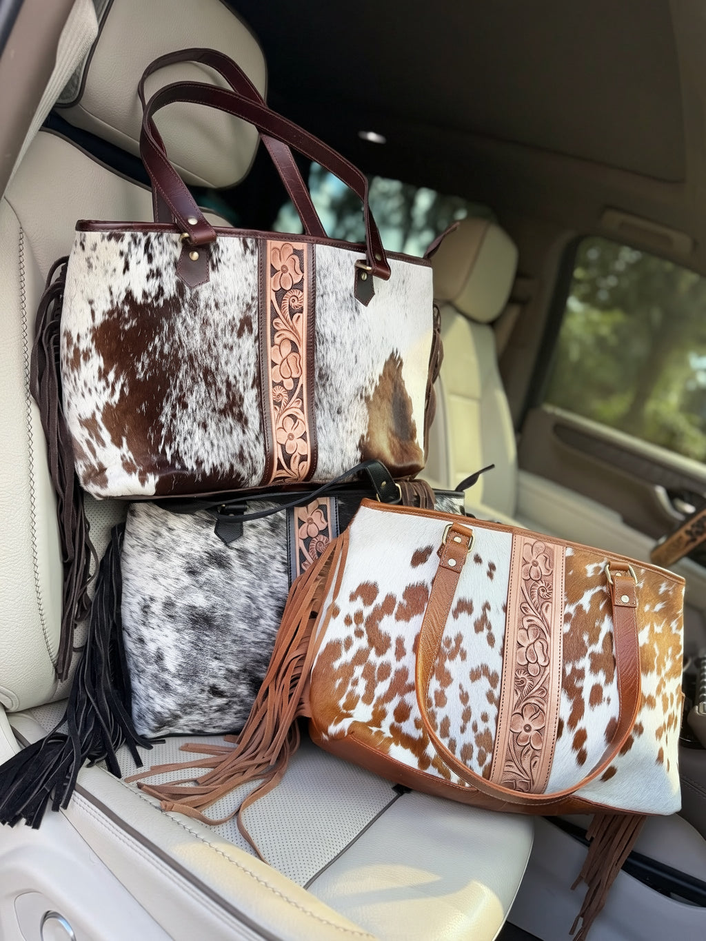 Fringe cowhide purse