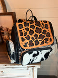 Tooled leather bookbag