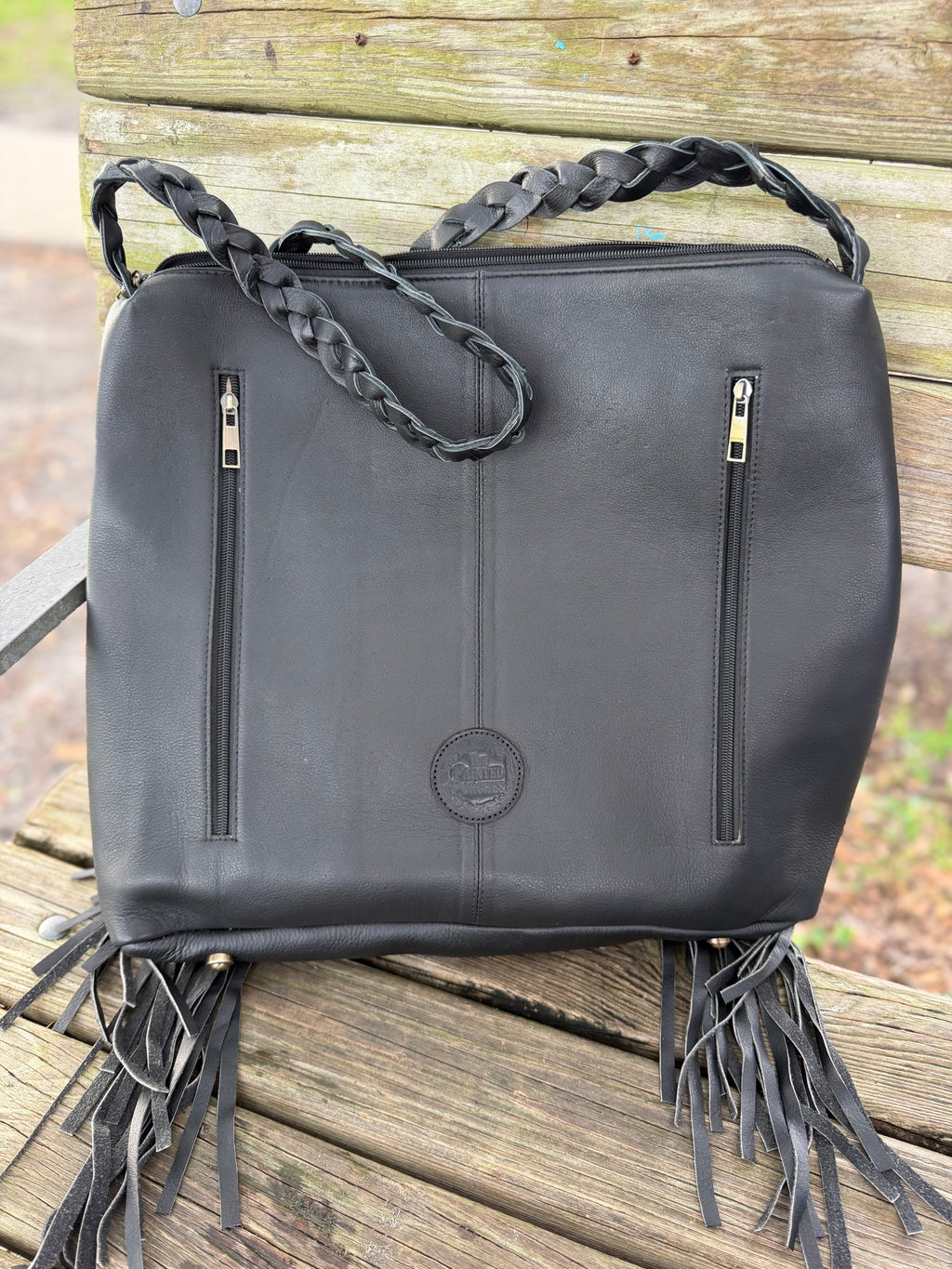 Checker tooled leather hobo bag with fringe