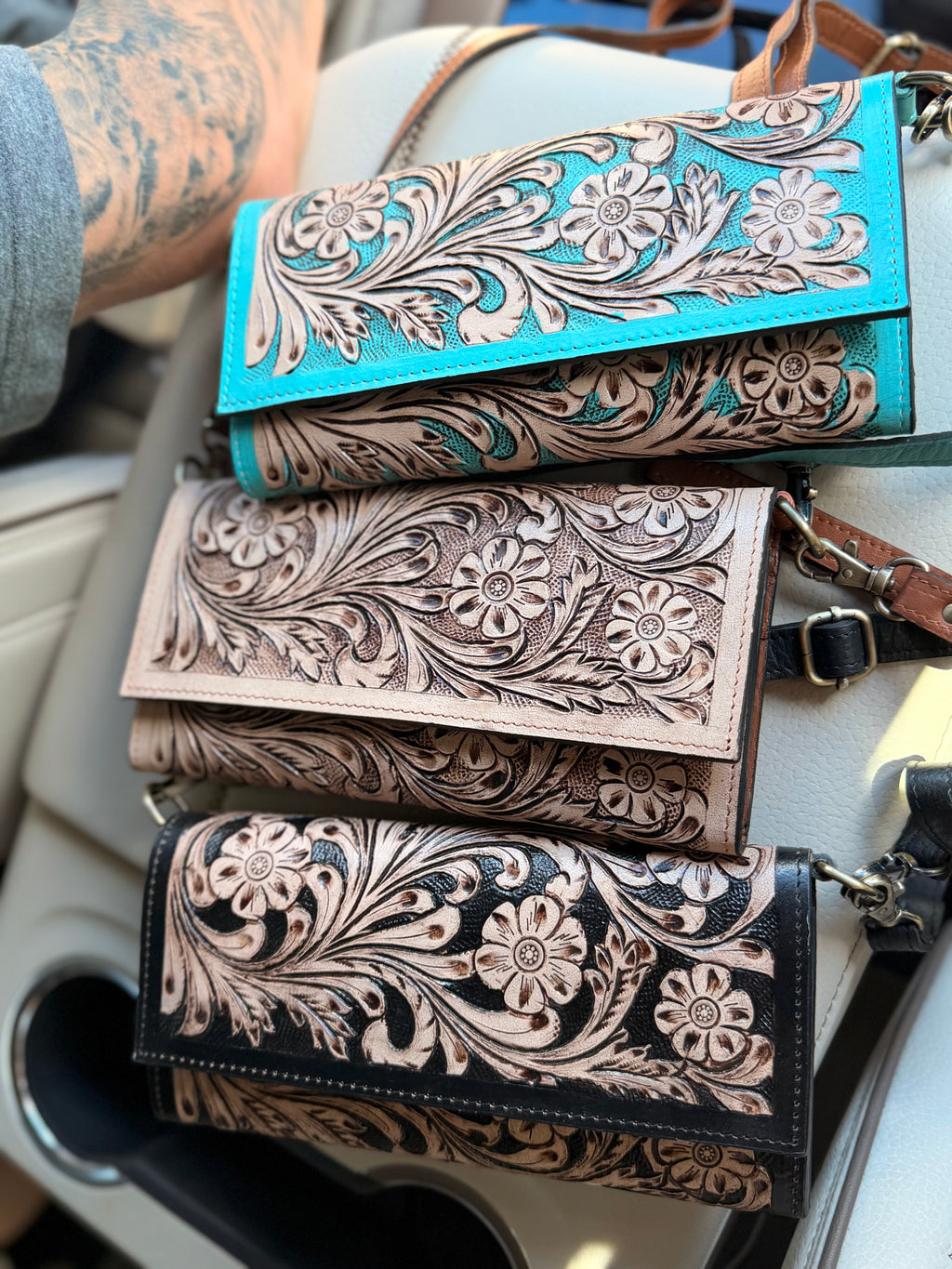 Tooled leather clutch crossbody