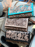 Tooled leather clutch crossbody