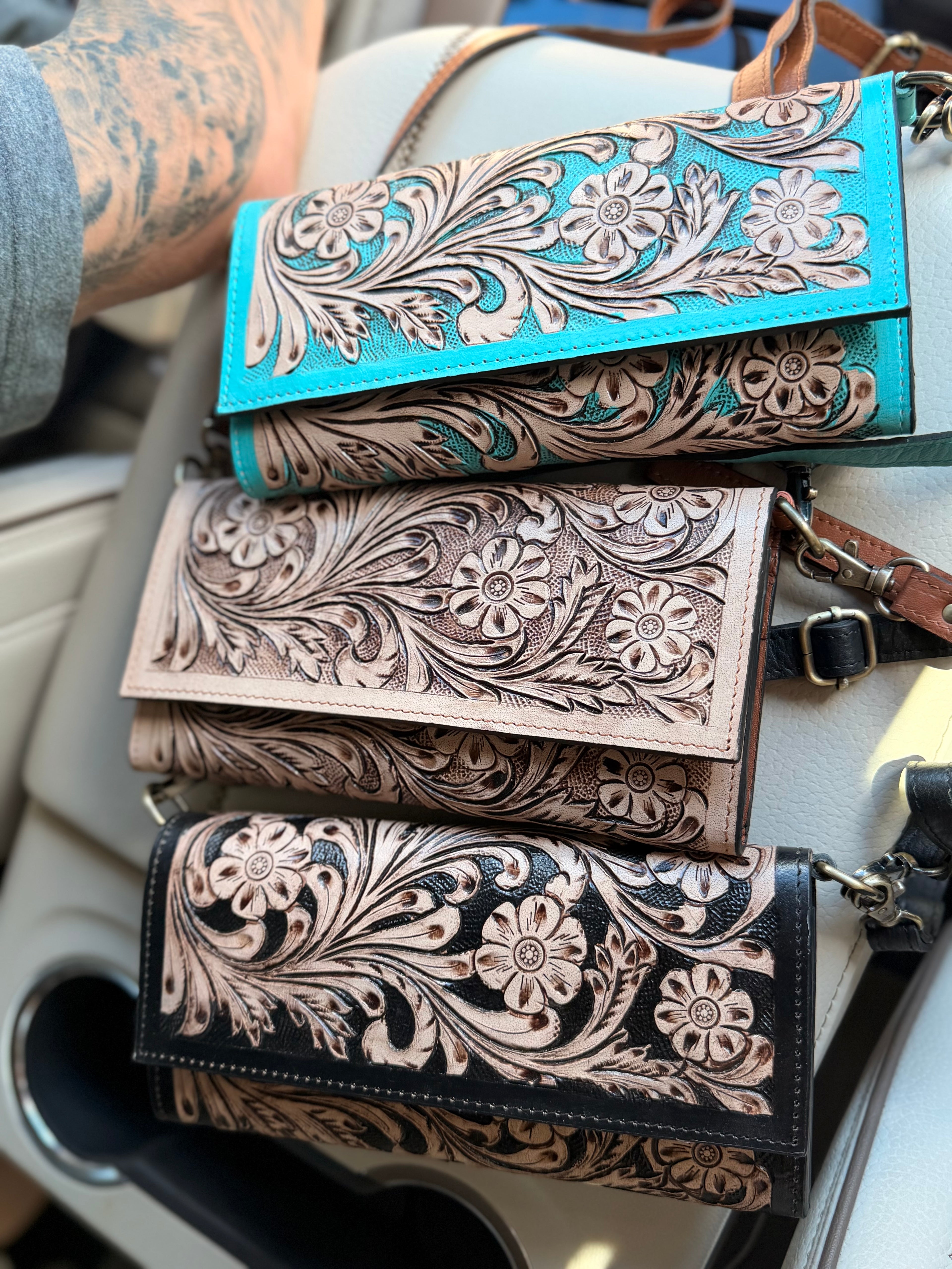 Tooled leather clutch crossbody