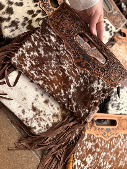 Tooled leather cross body bags comes with long strap