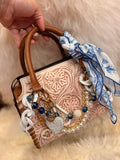 “The Frontier Socialite”- white/cream tooled leather speedy (M)