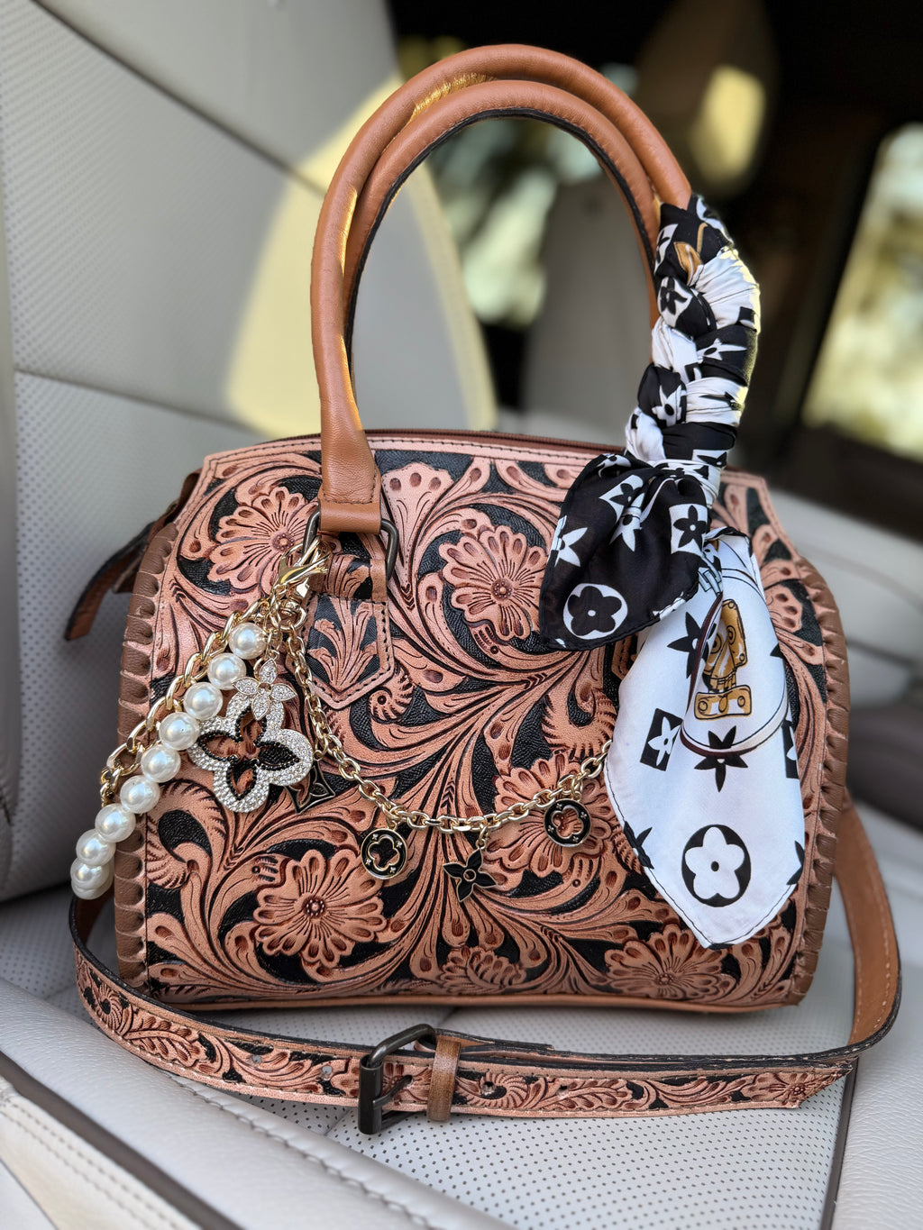 “Cowgirl royalty”- tan and black tooled leather speedy (M)