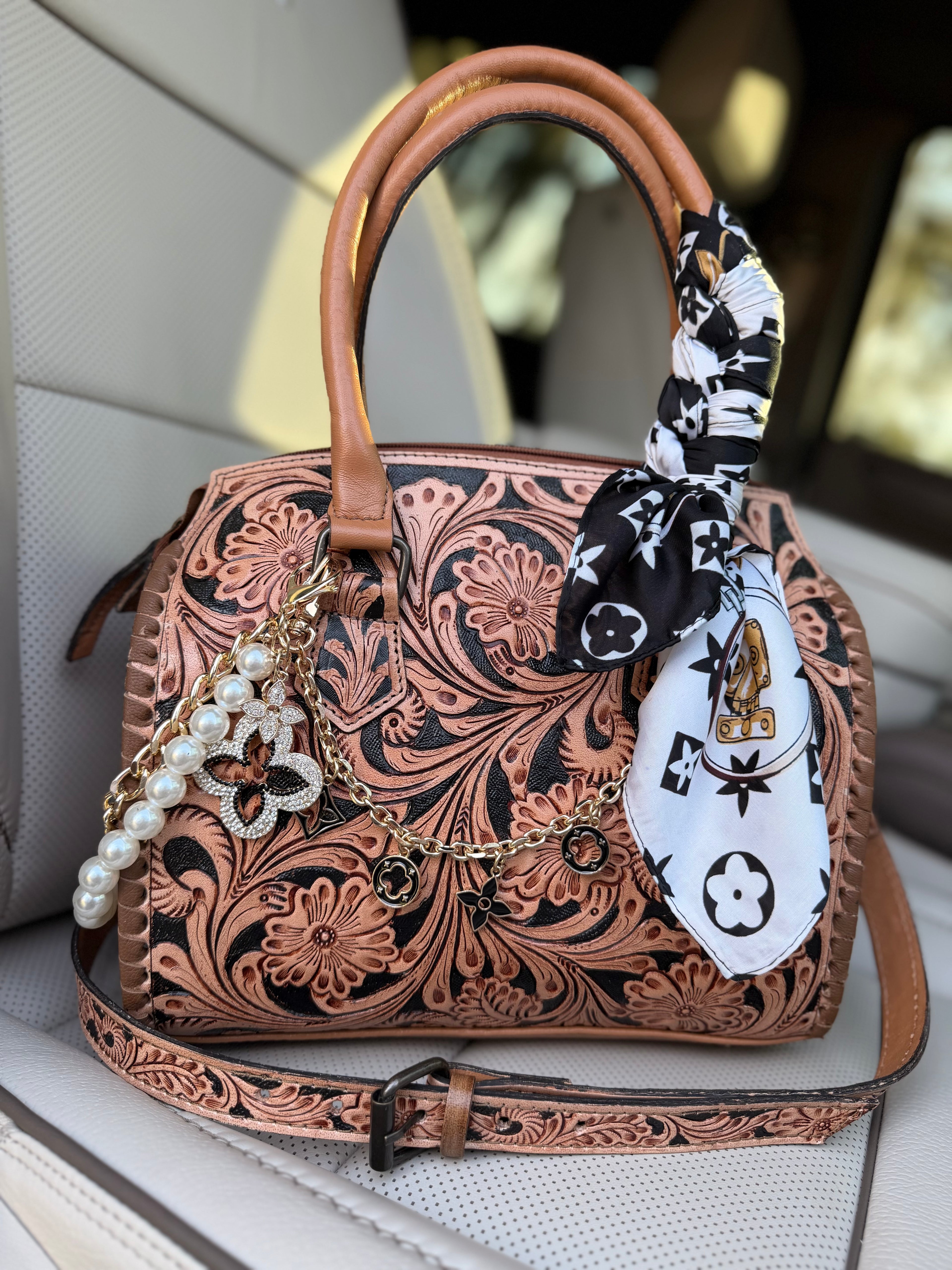 “Cowgirl royalty”- tan and black tooled leather speedy (M)