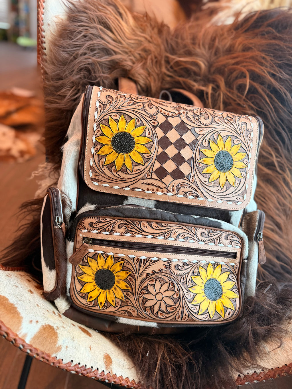 Tooled leather bookbag