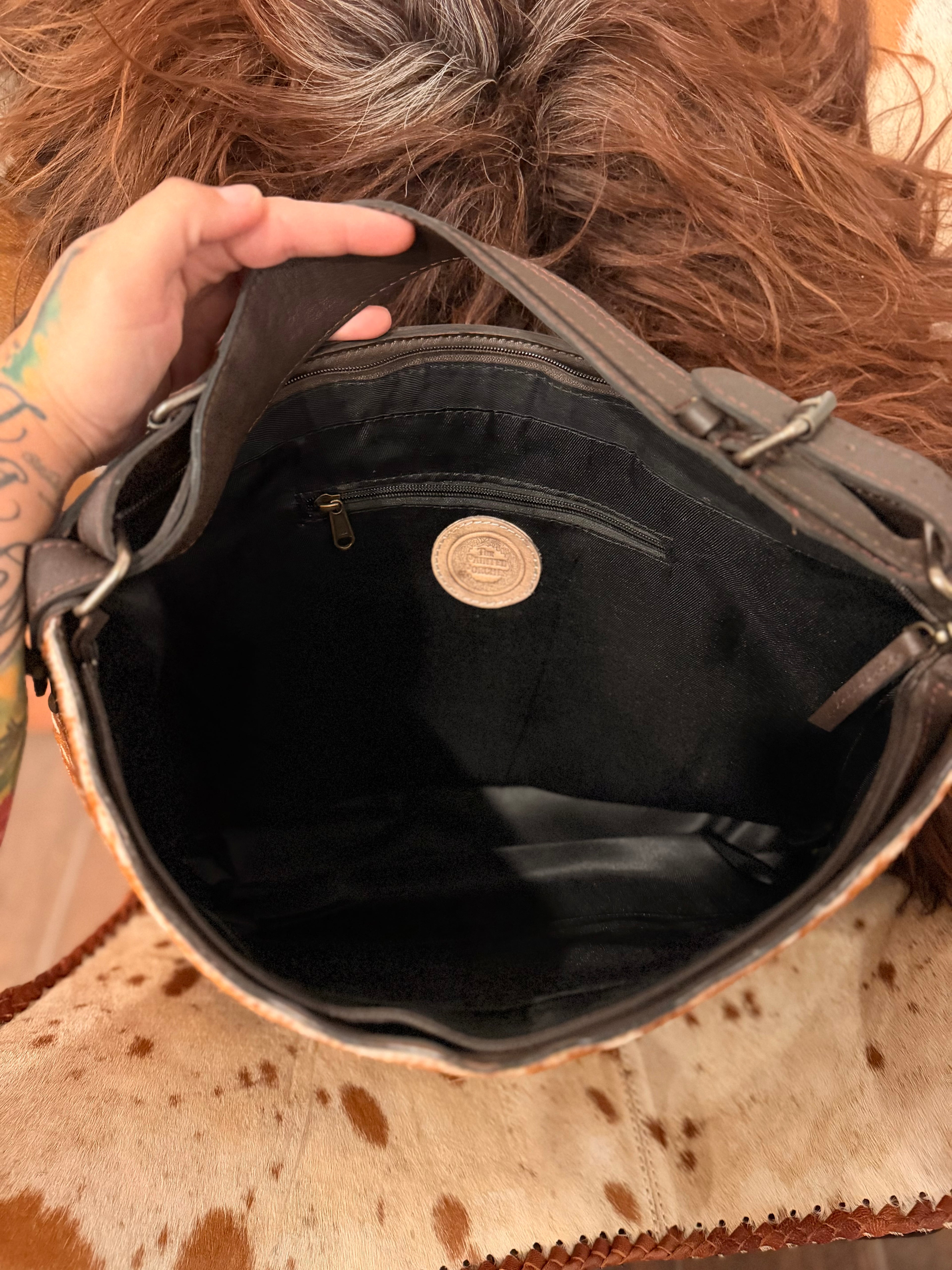 The Prairie Fawn - Bambi cowhide &  leather hobo bag / by The Painted Porches