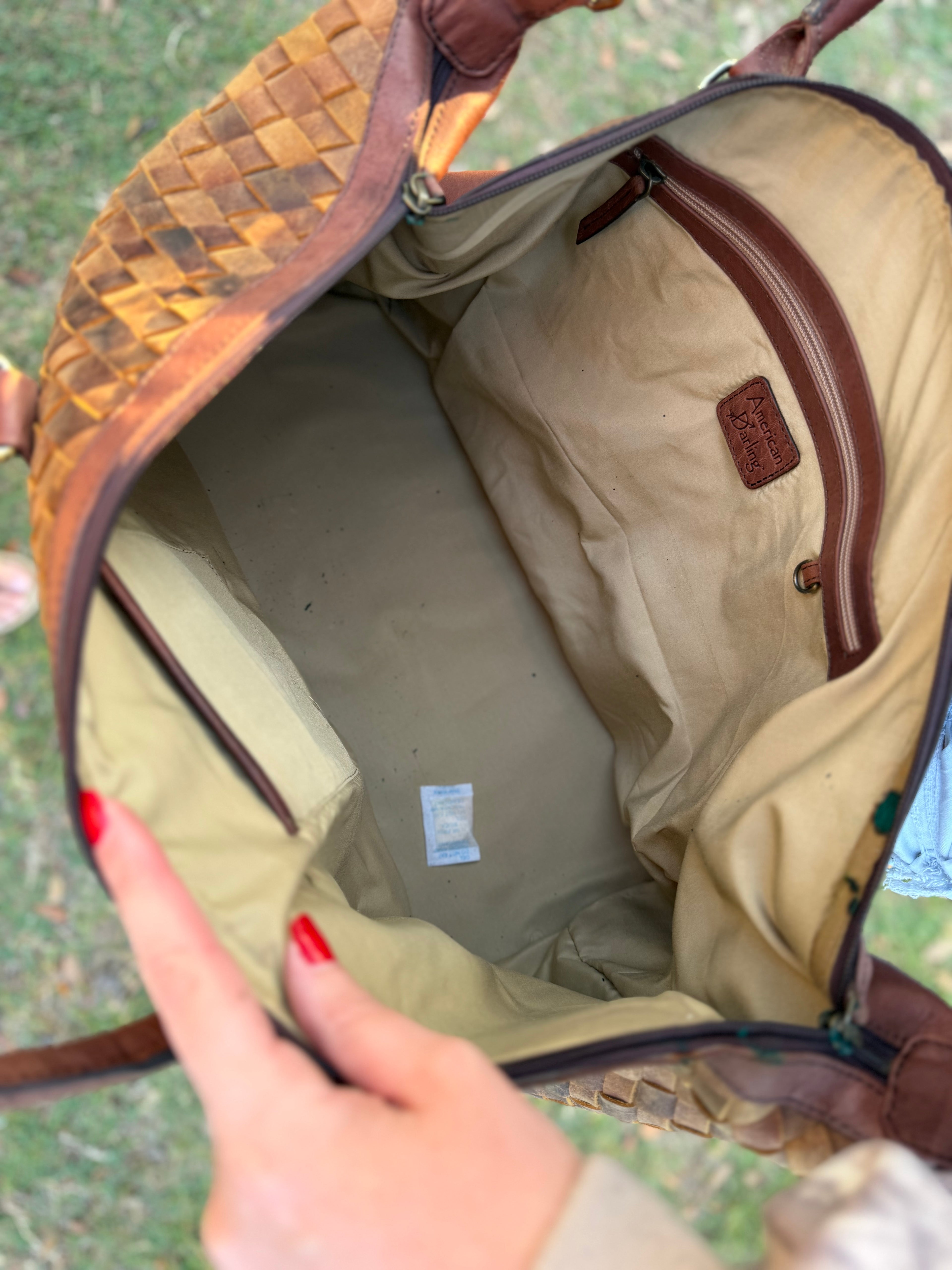 Brown leather woven duffle