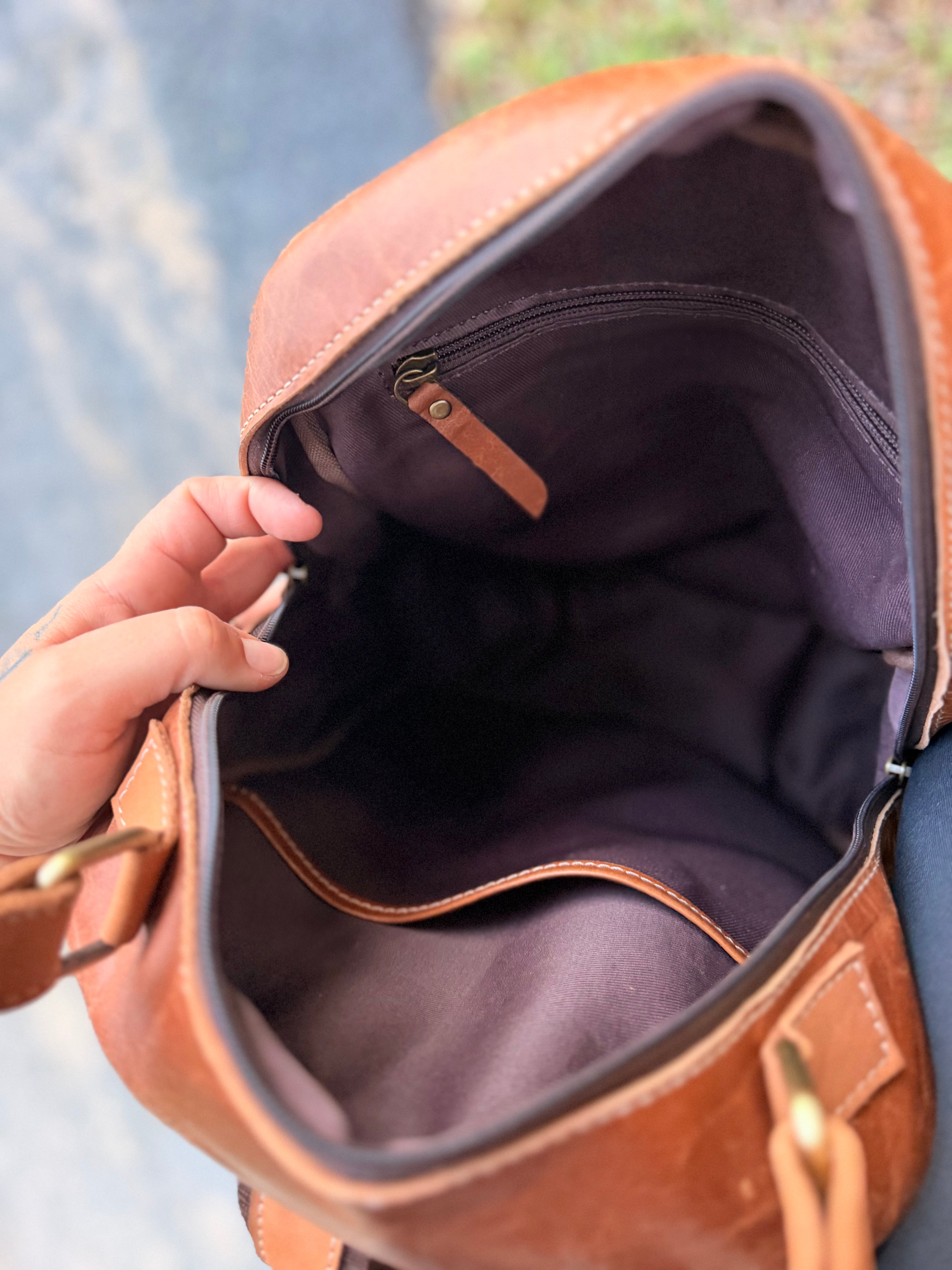 The “Hunter” camo leather bookbag by the Painted Porches