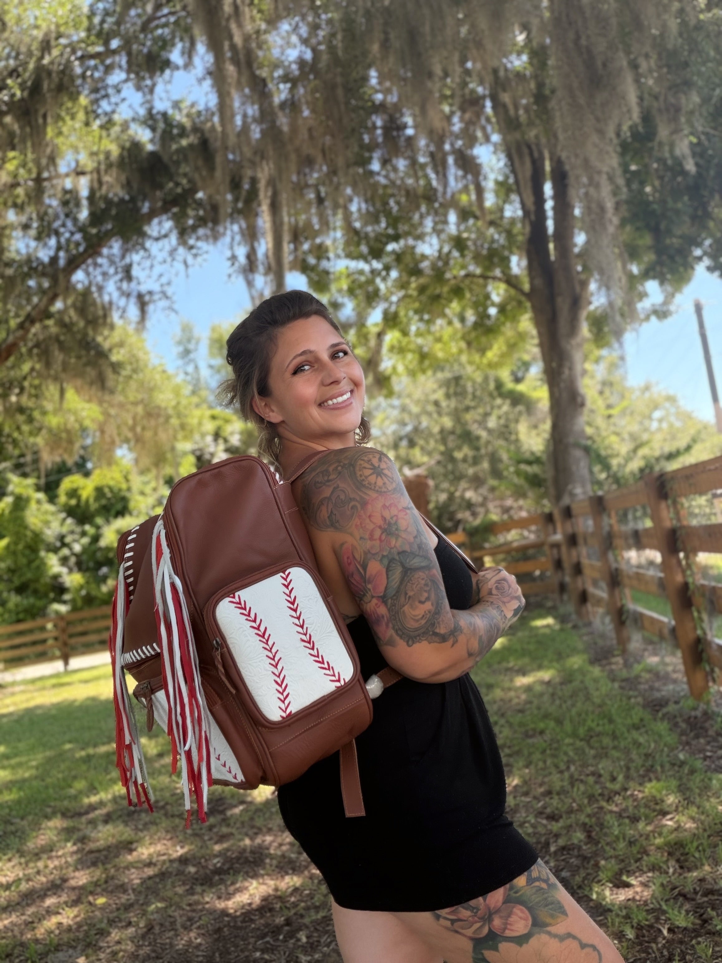 Leather fringe baseball bookbag