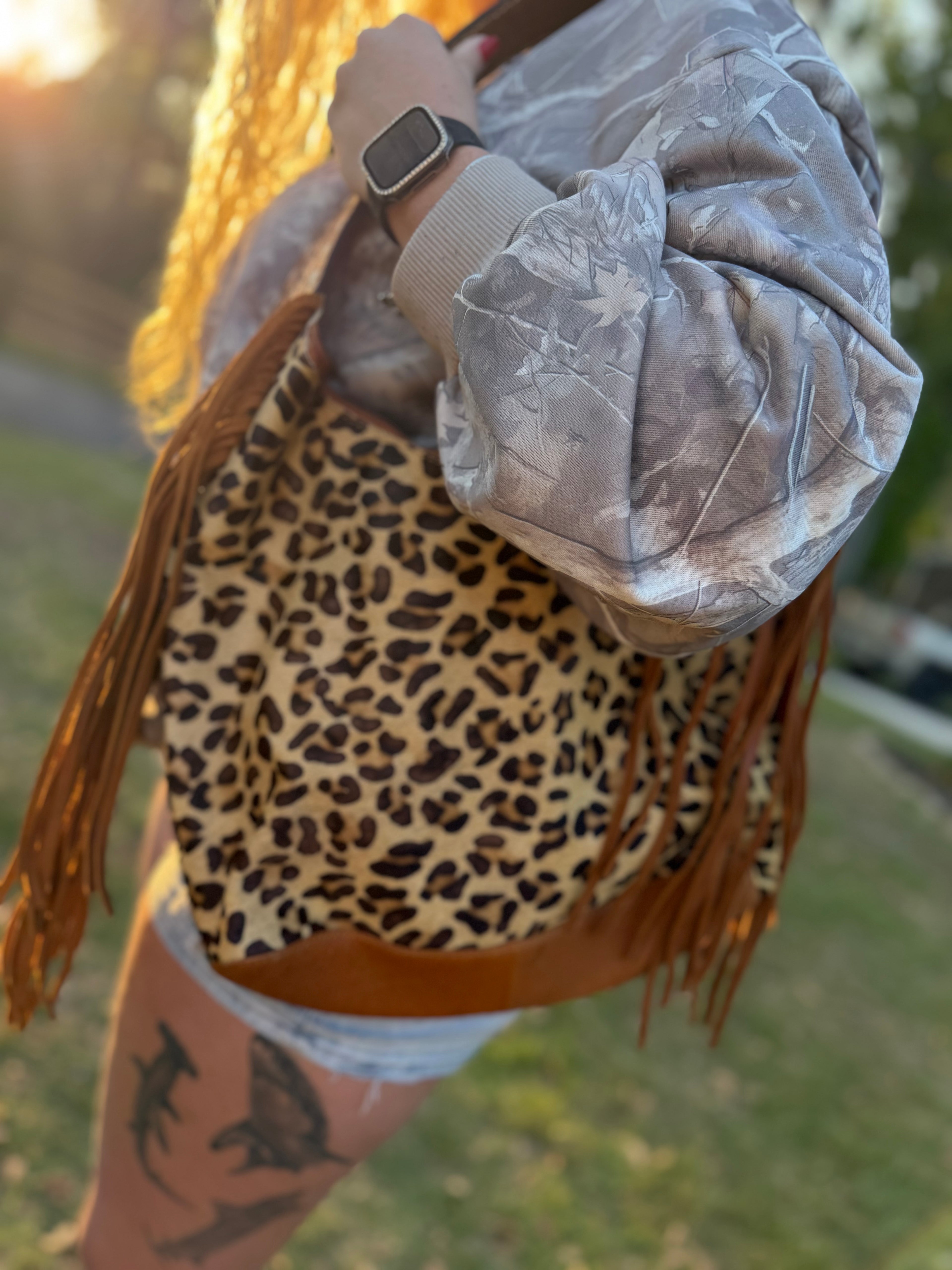 Cheetah print cowhide purse wirh fringe