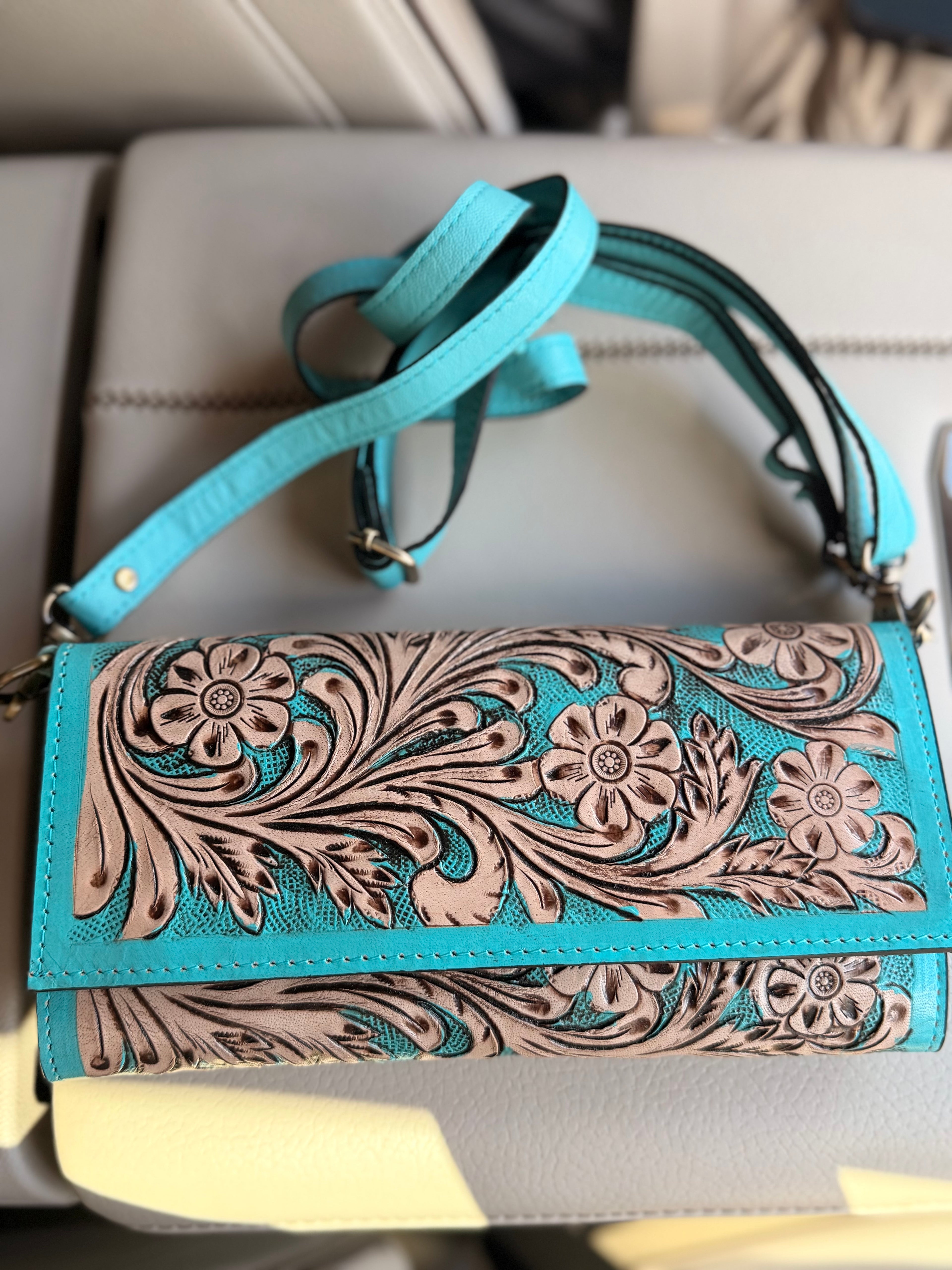 Tooled leather clutch crossbody