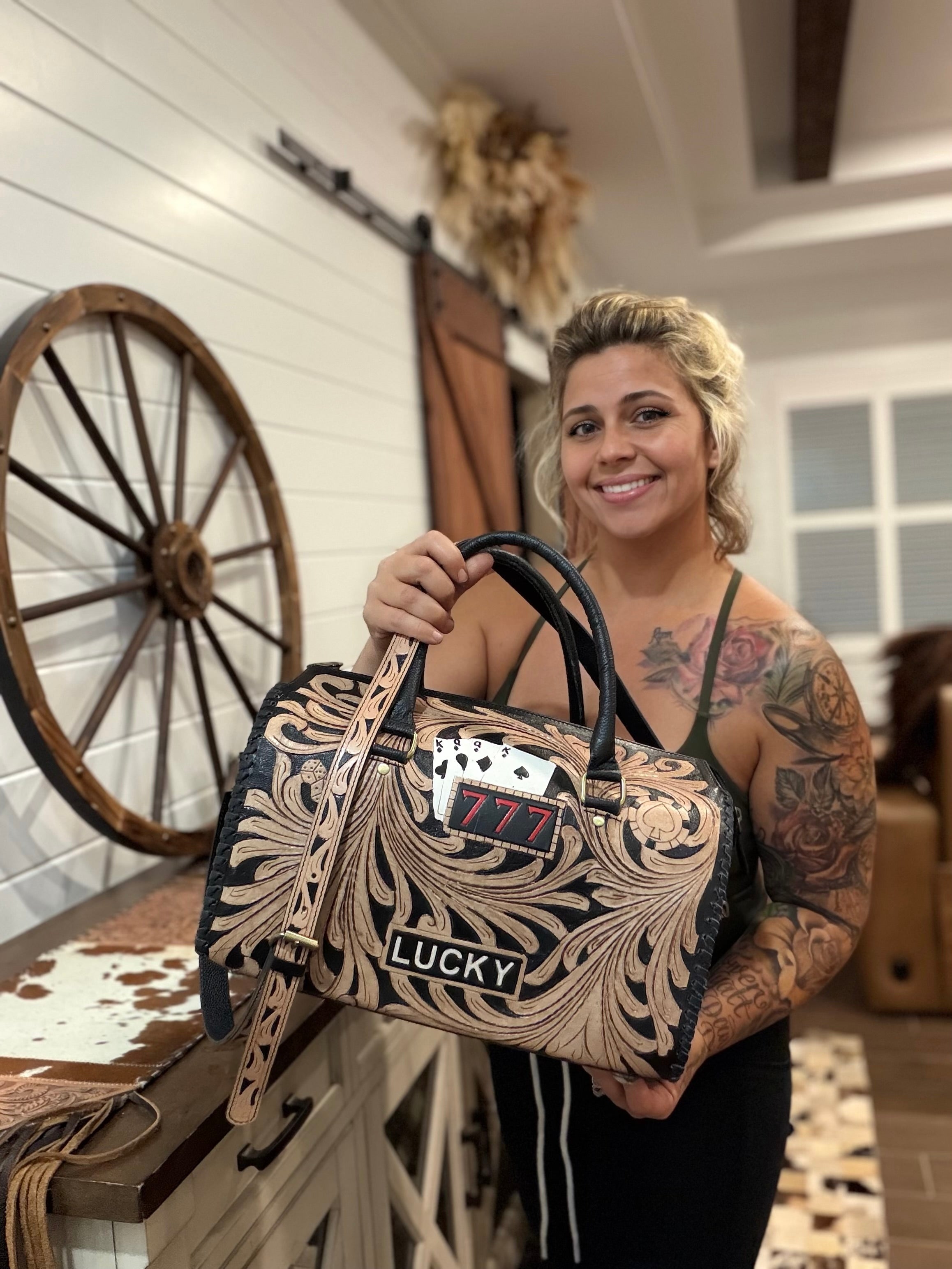 777 tooled leather speedy duffle (L)