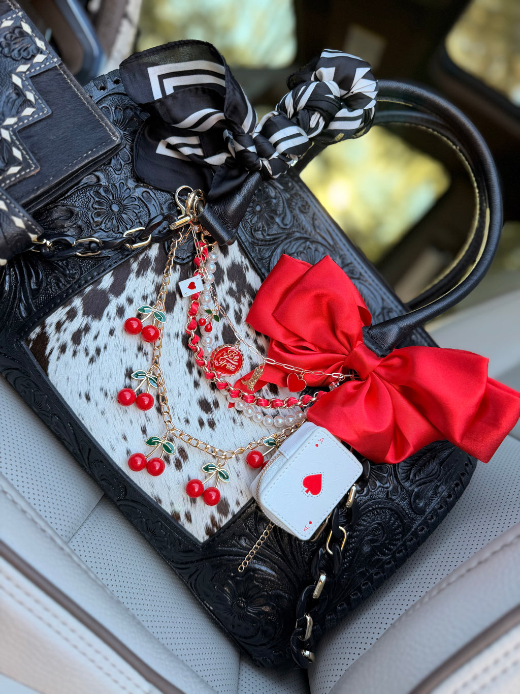 "All Bets on Red" - black tooled leather speedy (Duffle)
