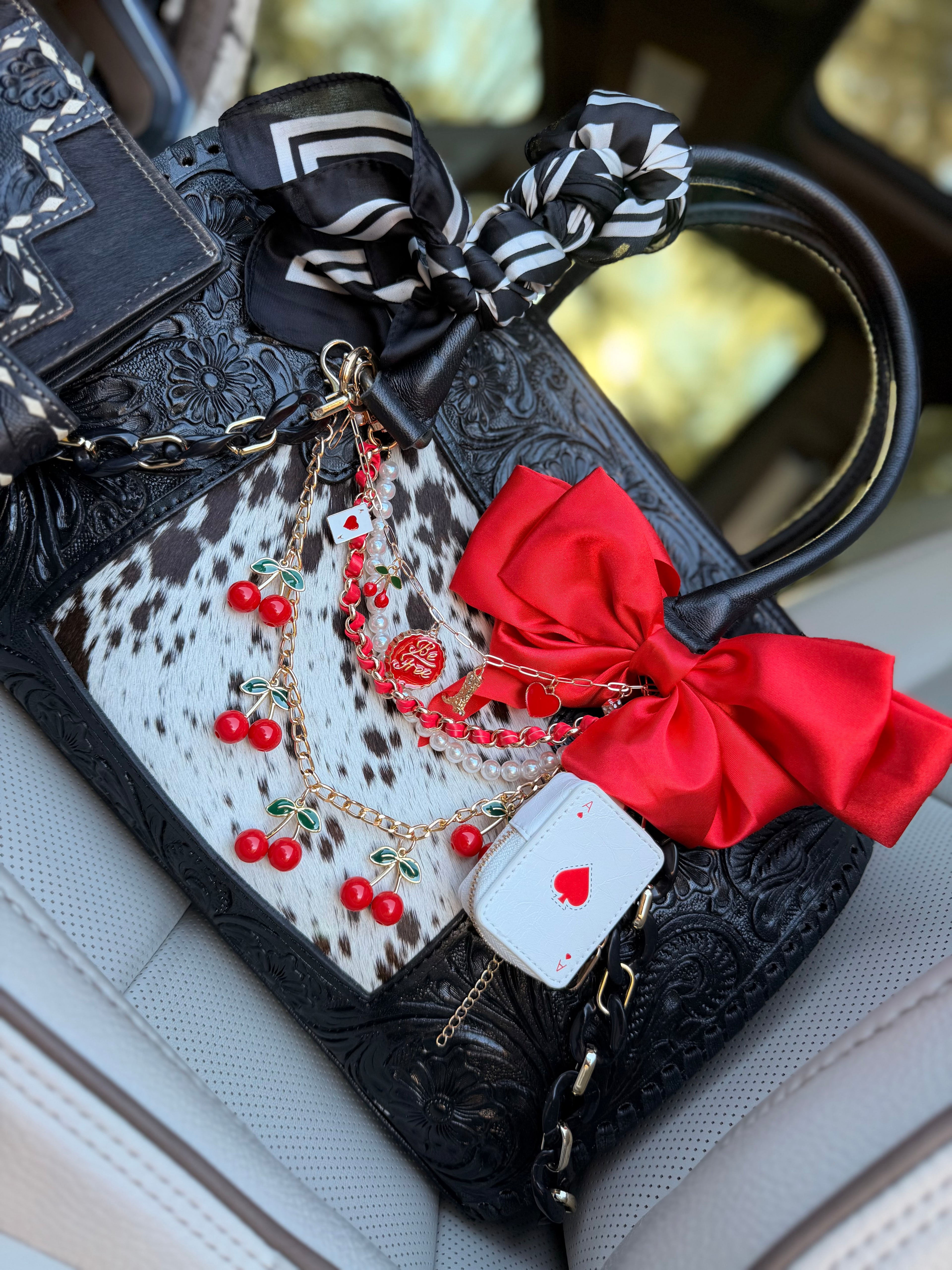 "All Bets on Red" - black tooled leather speedy (Duffle)