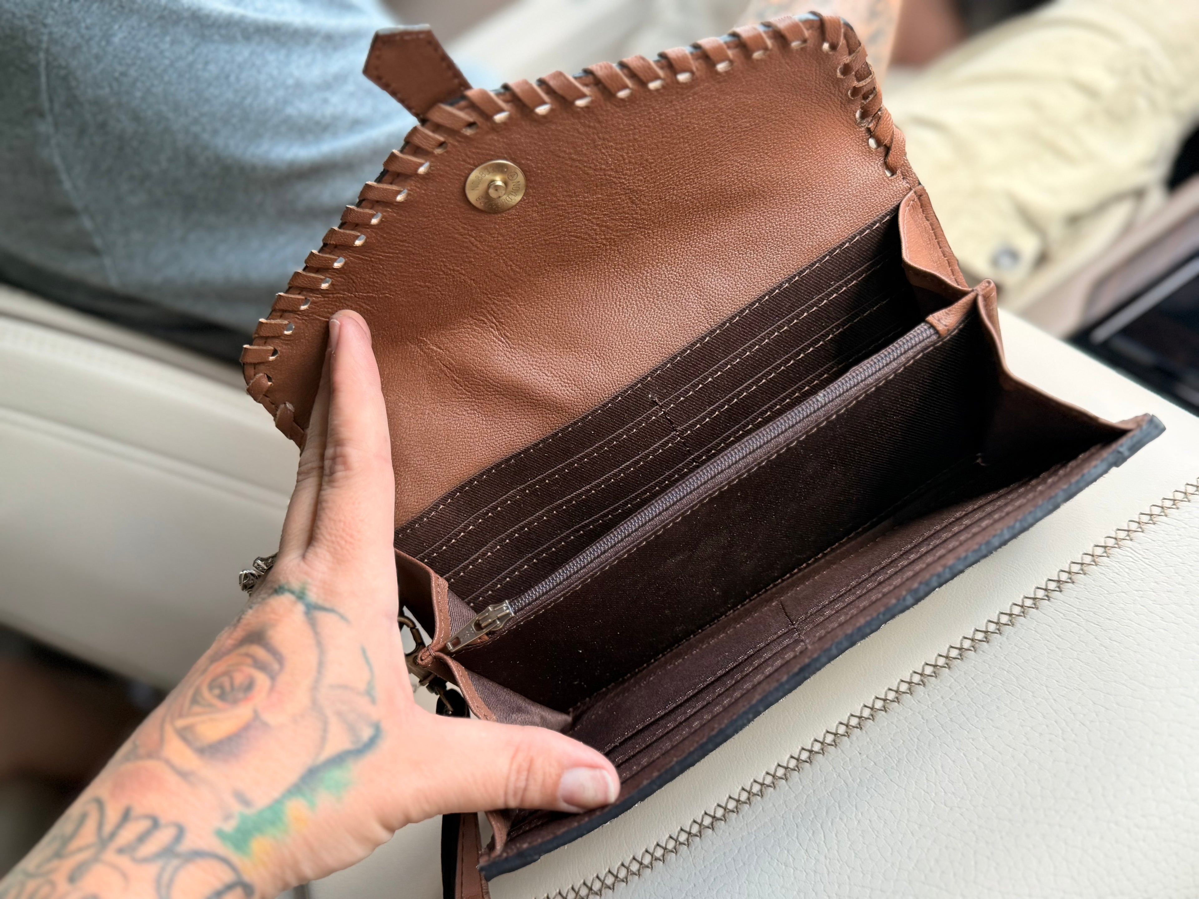 Tooled leather and cowhide wallet