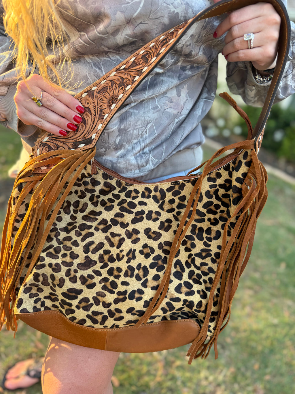 Cheetah print cowhide purse wirh fringe