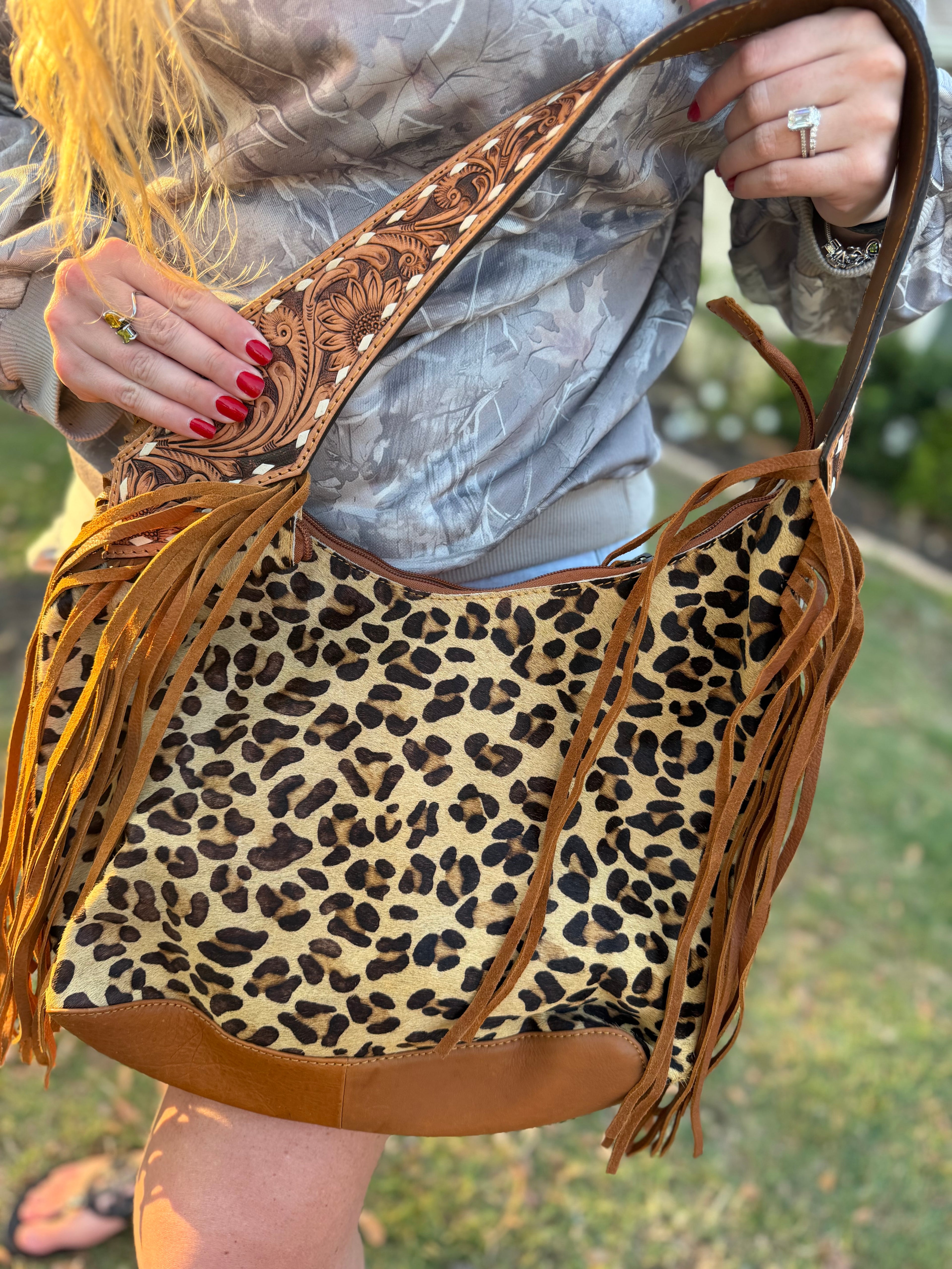 Cheetah print cowhide purse wirh fringe