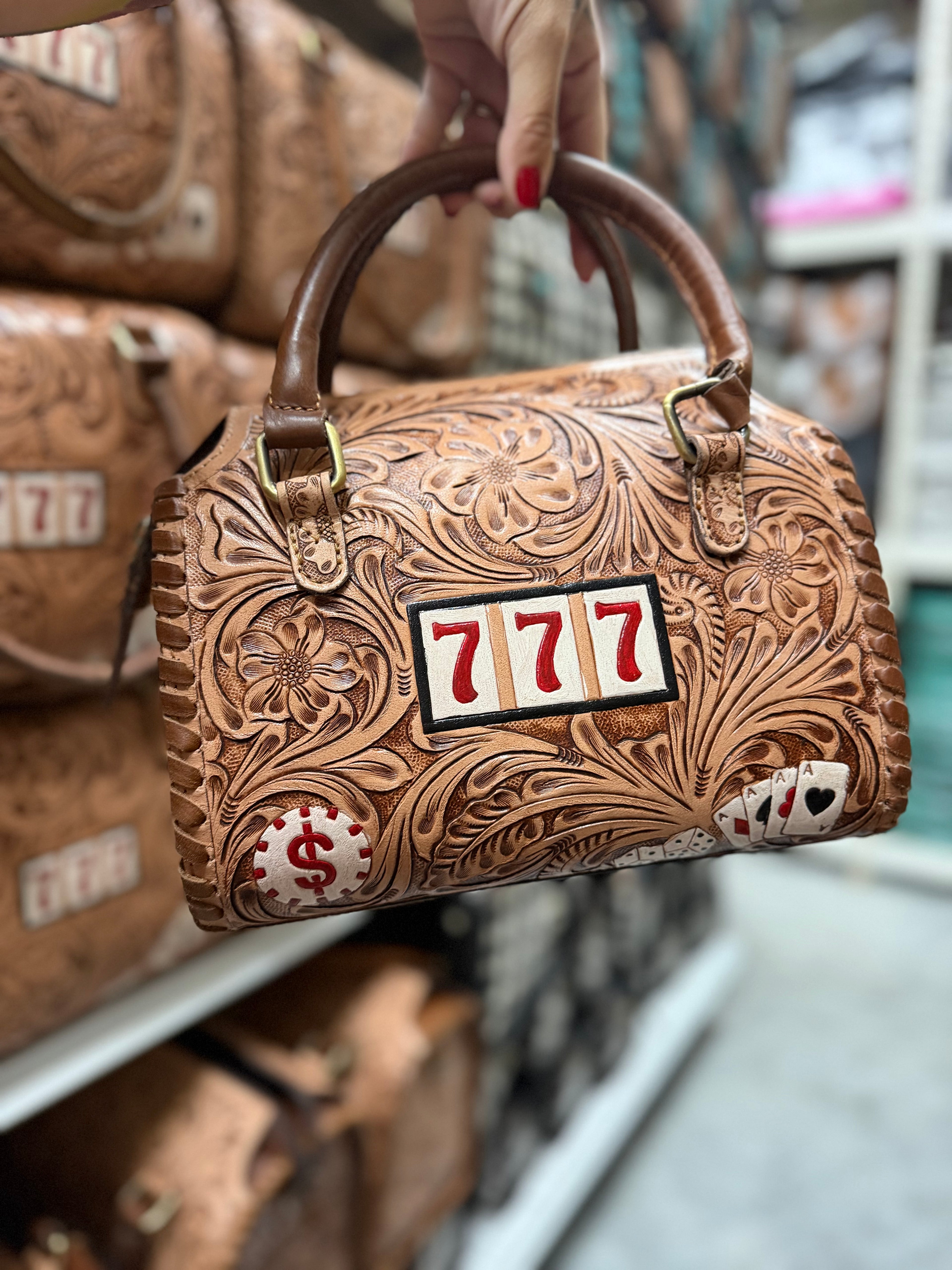 777 brown tooled leather speedy (M)