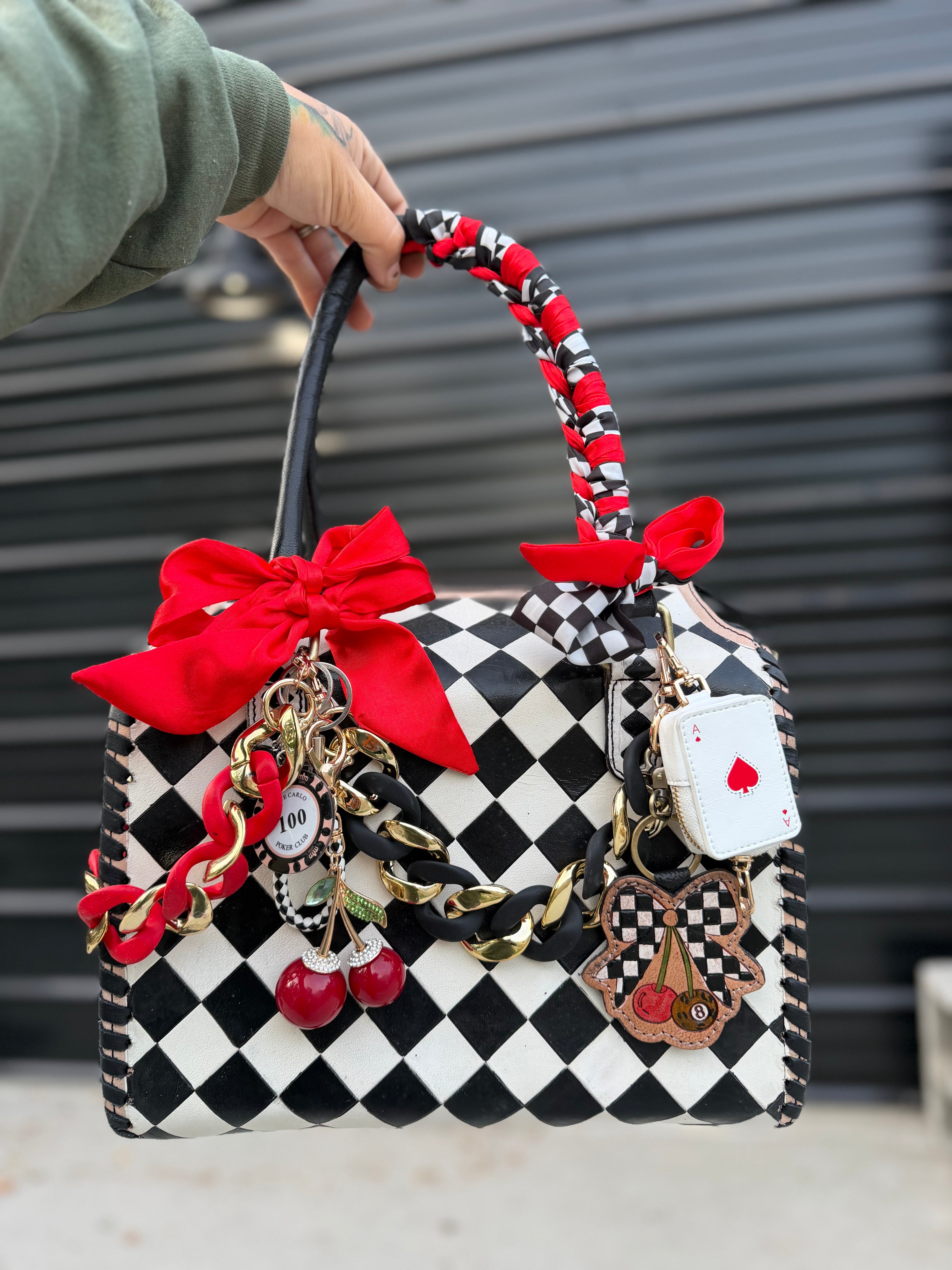 “The Queen of the Casino” tooled checker leather speedy (L)