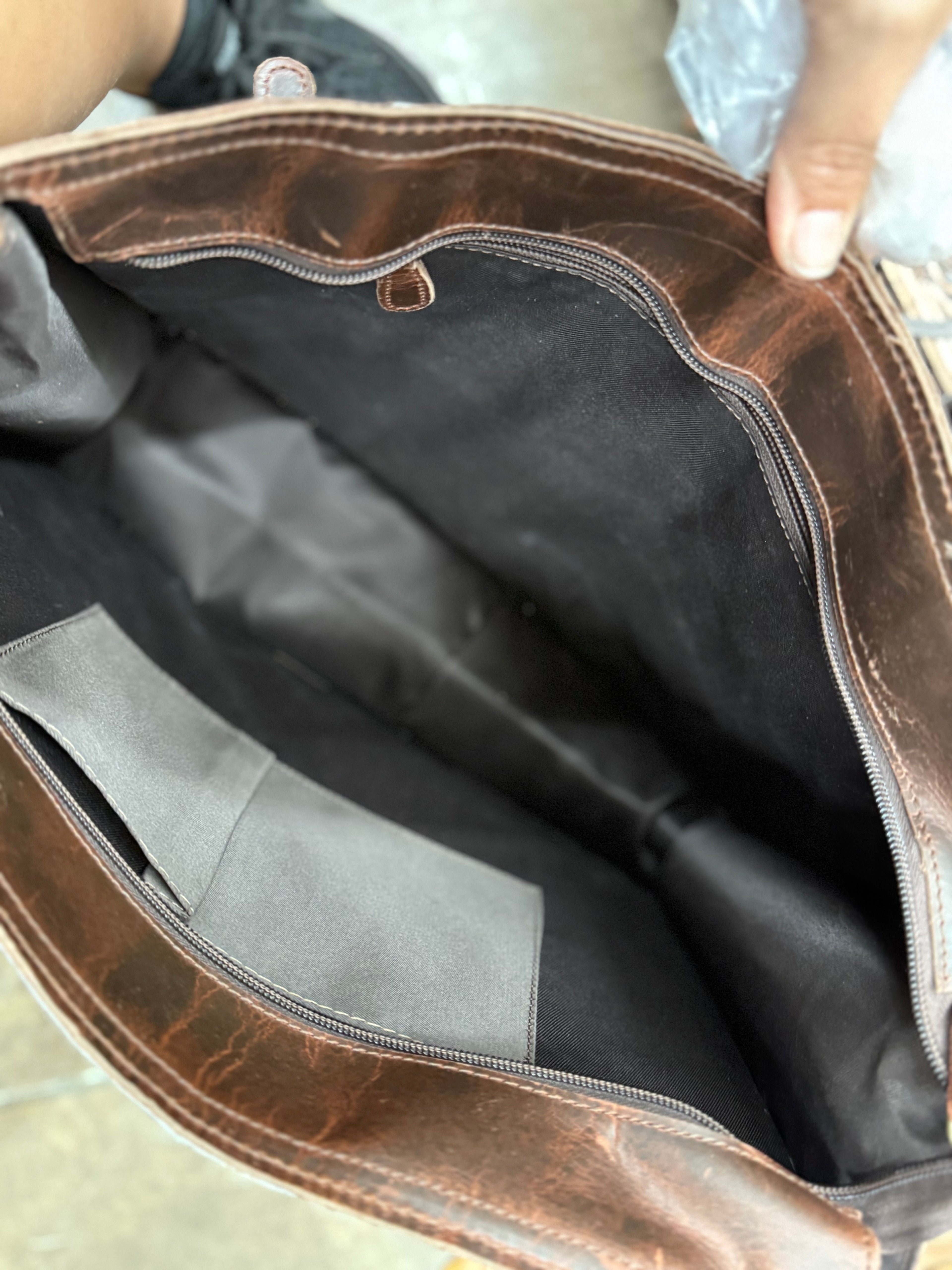 Cowhide and tooled leather purse - 16”x12“