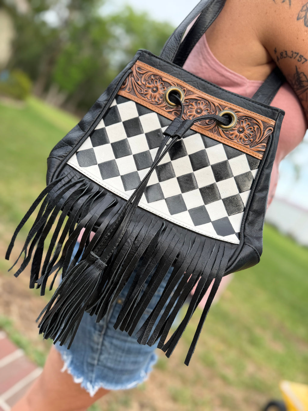 Checker sling bag with fringe