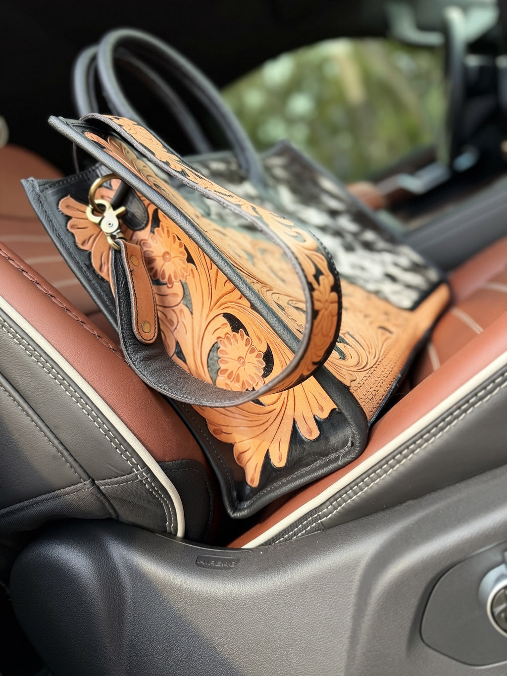 Tooled crossbody / cowhide tote bag