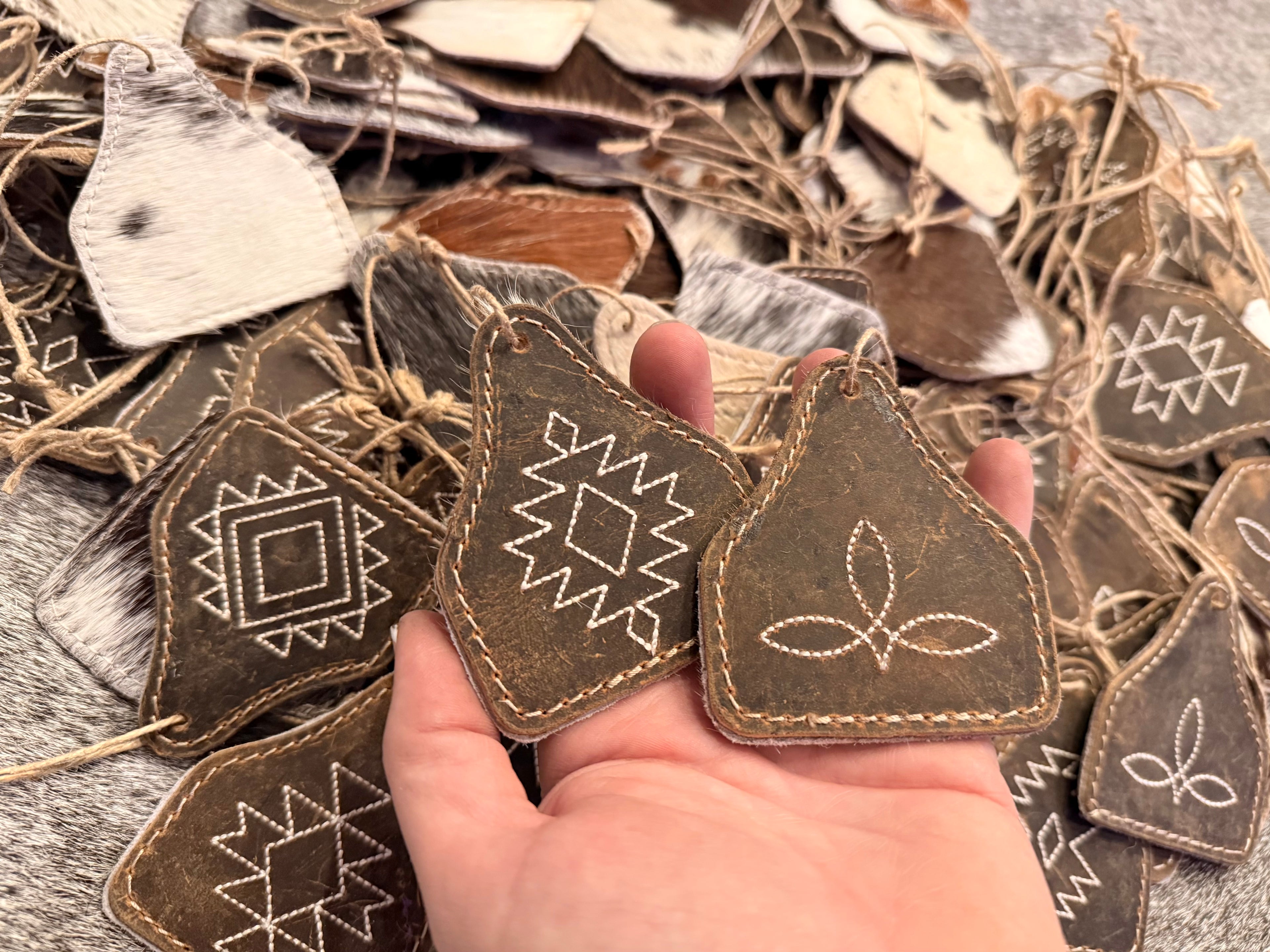 Western stitched, leather and cowhide ornament Western stitched, leather and cowhide ornament 3”