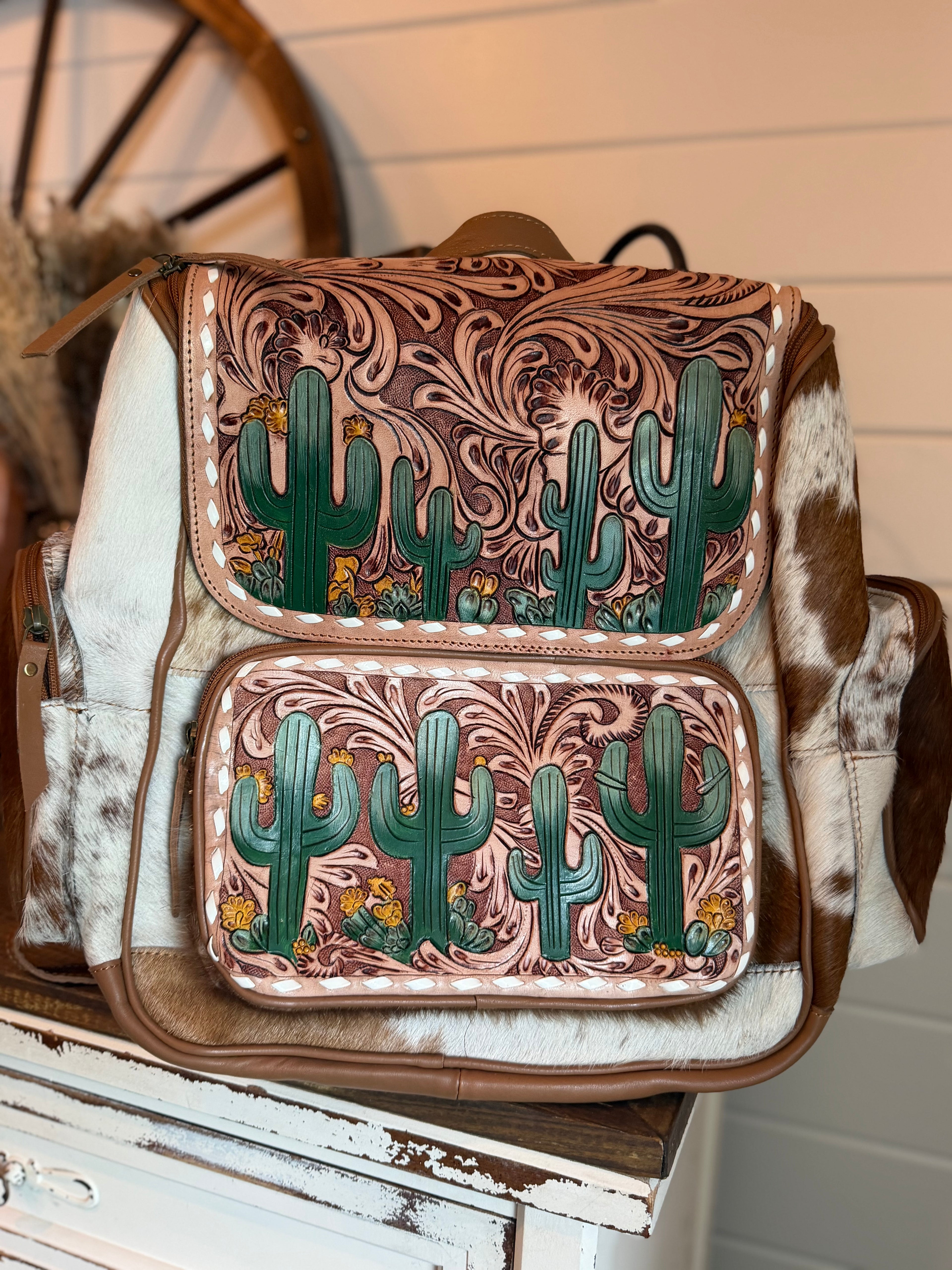 Tooled leather bookbag