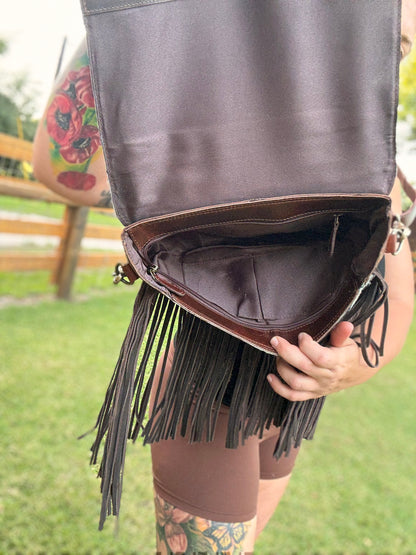 Tooled cowhide purse