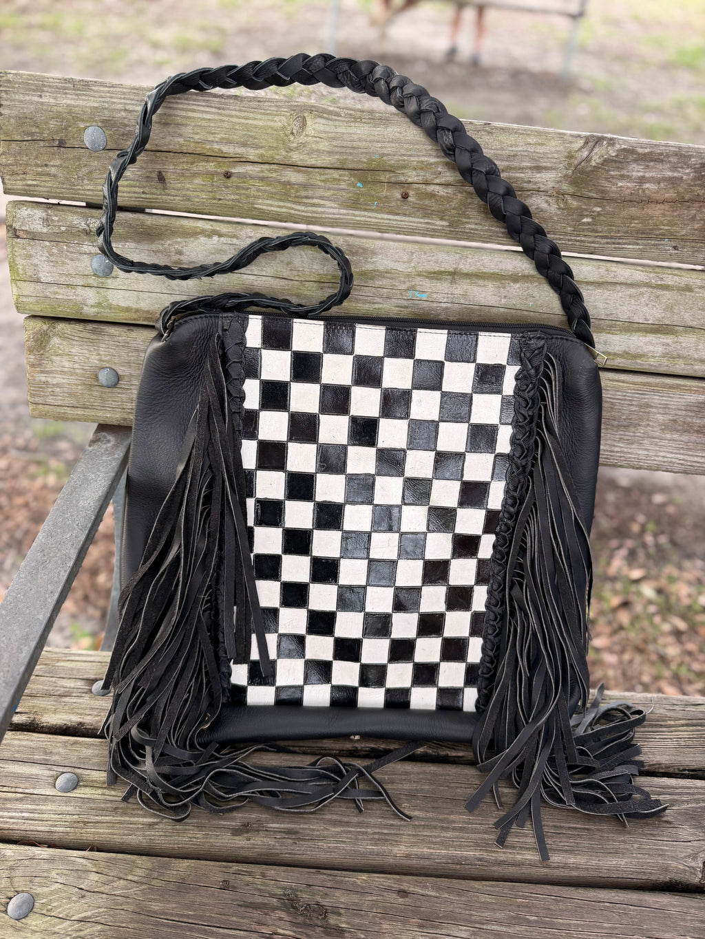 Checker tooled leather hobo bag with fringe